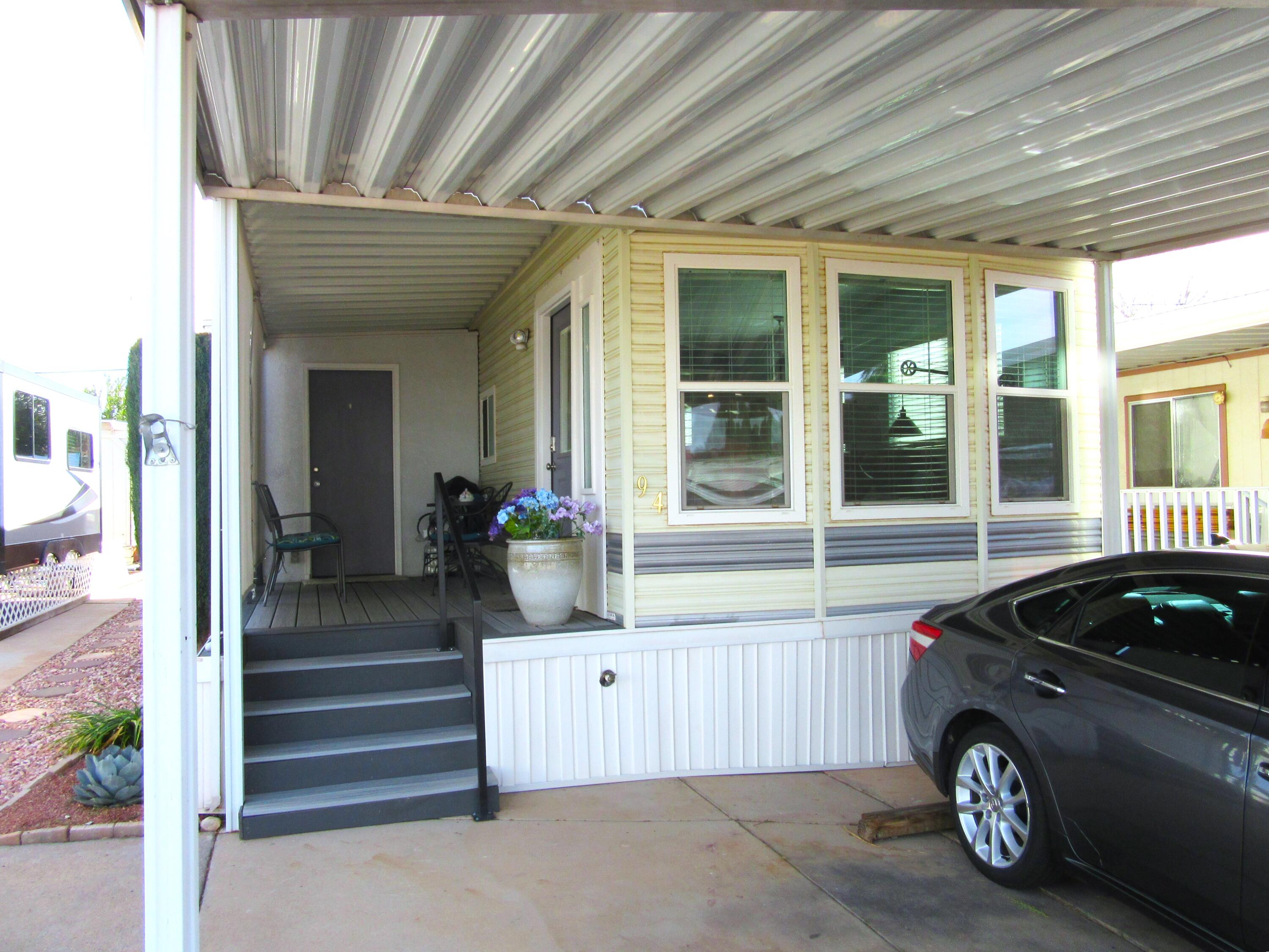 Clean, updated and mostly furnished, 2-bedroom Park Model on an owned lot in a desirable 55 + community. with 2 clubhouses. Completed updates have been a new roof, exterior siding/paint, dual pane windows, flooring throughout, interior paint, window treatments, ceiling fans and light fixtures. New HVAC System 4 weeks ago, new TREX front porch/deck, brand new fridge, washer and dryer. The second bedroom is being used as an office and laundry room. Everything in the home can stay with the home if desired.