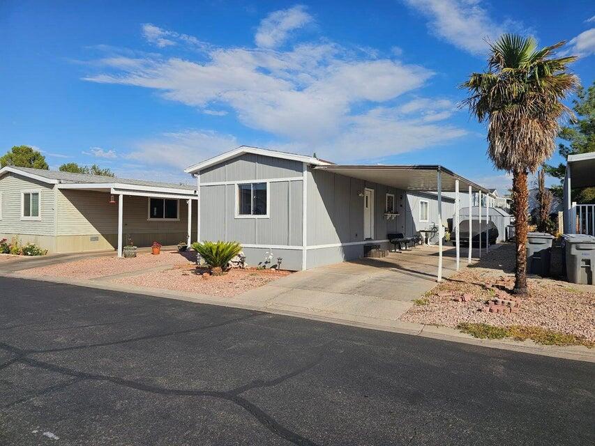 This home is conveniently located in the Canyon View Community.  Freshly renovated with modern kitchen upgrades including an oversized island, perfect for gathering everyone around.
Move-in ready.  Upgraded tile showers and shed in back for extra storage.  And financing options exist!  Seller will carry or will pay the first 6 months of the lot rent with the right offer!  This is a must see.