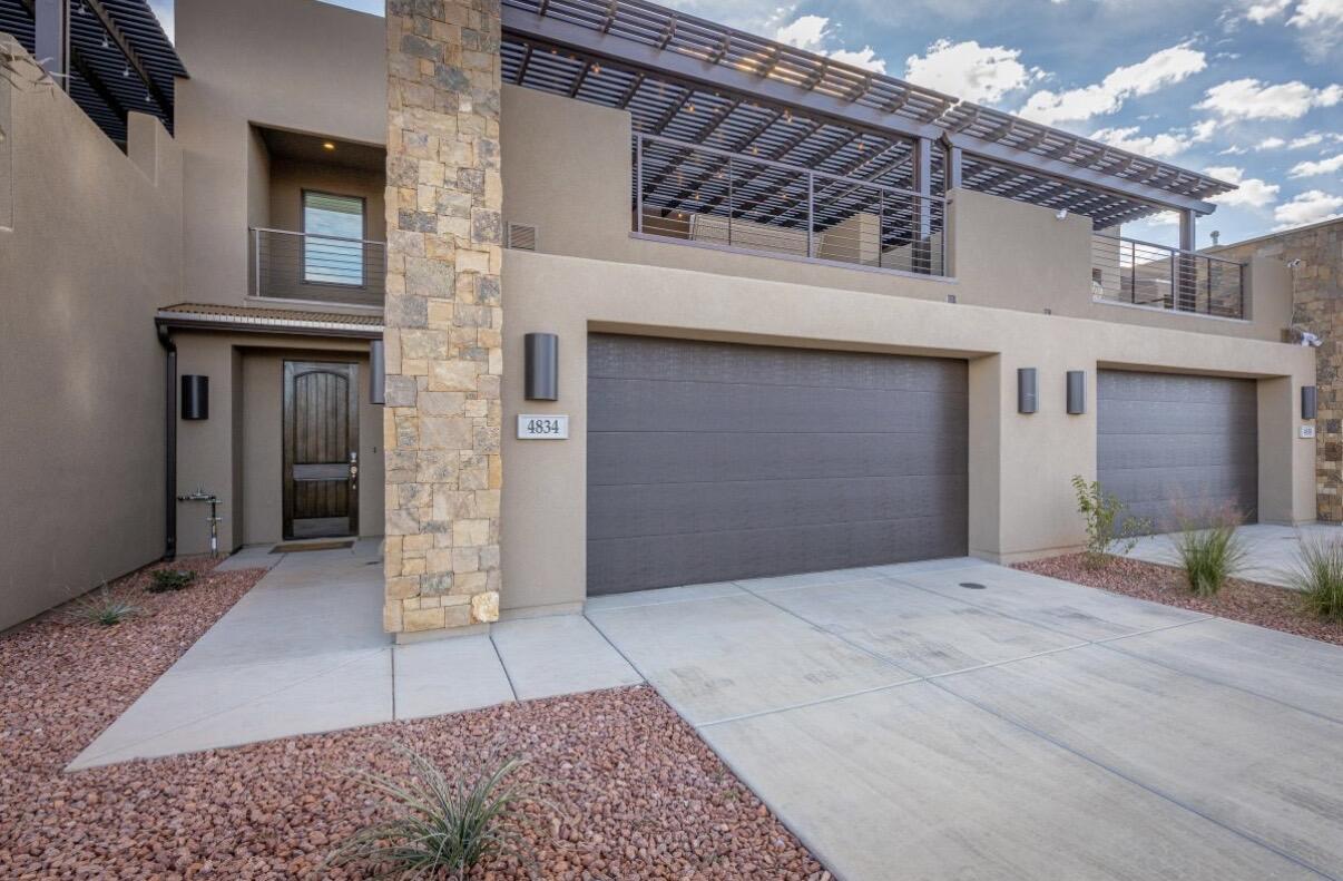 Beautiful turnkey, nightly rental approved residence offering four bedroom and 4.5 bathrooms. This modern spacious retreat delivers spectacular red rock views on a private deck overlooking the Escapes community pool. Upstairs loft with 3 bunkbeds to accommodate large groups. Each bedroom with there own en suite for convenience. Two car garage and just steps away from additional parking and community pool and hot tub.