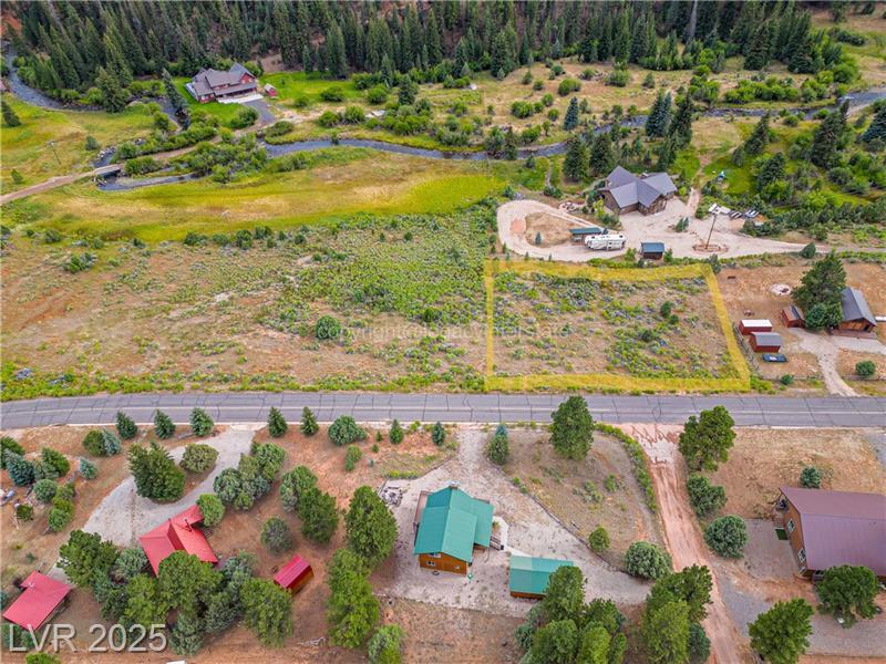 Calling all adventurers! This flat, build-ready lot in Aspen Highlands is your base camp to endless exploration. With Mammoth Creek rushing just behind the property and epic mountain views in every direction, nature surrounds you at every turn. Nestled among rustic cabin homes with easy, year-round access off a paved road, you're perfectly positioned for adventure. Just minutes from Panguitch Lake, Brian Head, Duck Creek Village, and the red rock wonder of Bryce Canyon, this is where your wild journey begins. Build your escape, and let the mountains call you home.