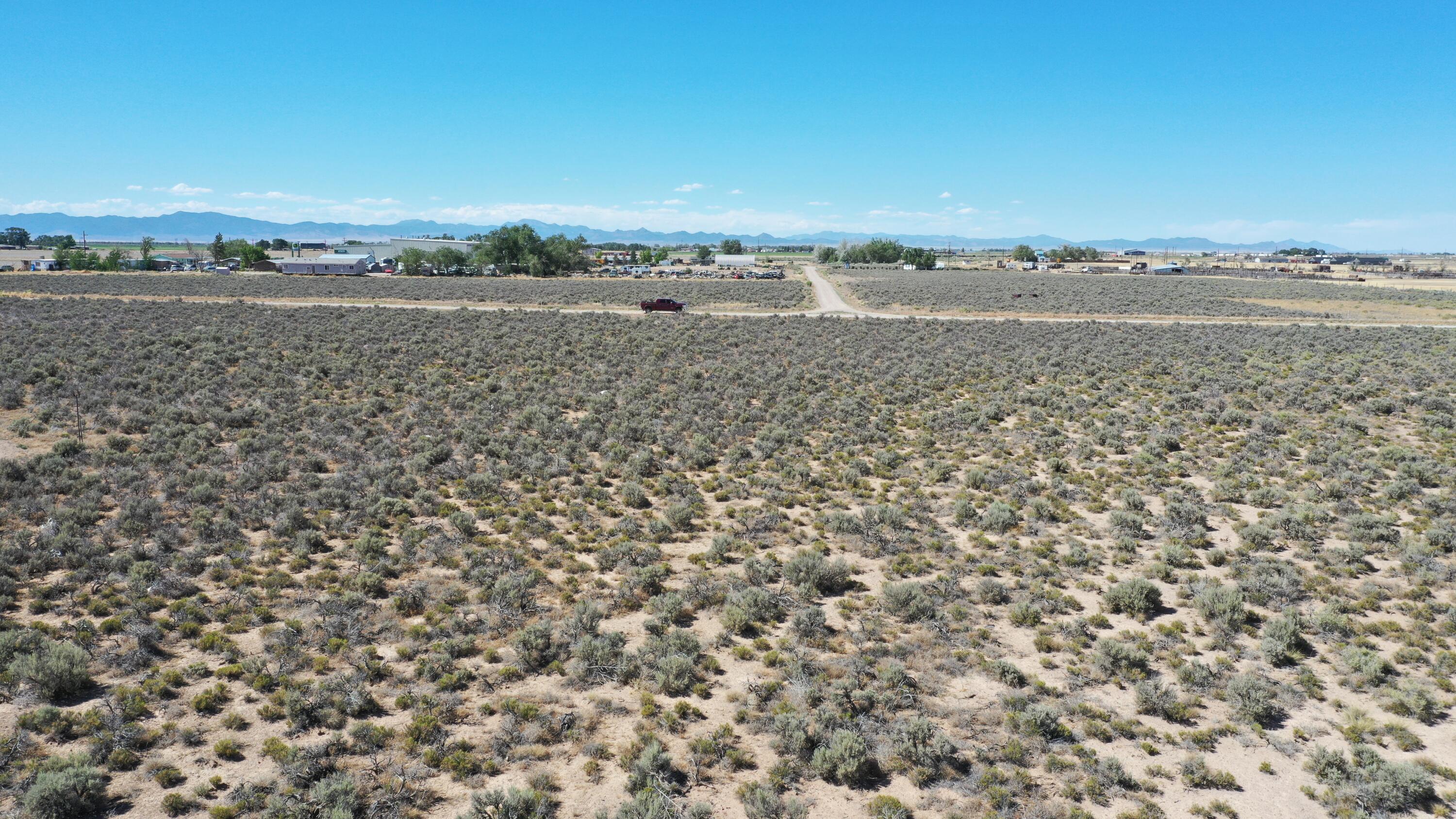 Build your dream country property on this 2.15-acre level parcel located just 1.5 miles south of Beryl Junction and only 10 miles north of Enterprise, Utah. The property includes 0.50 acre-feet of water rights, with additional water available, making it ideal for a home, shop, animals, gardening, or a small hobby farm. Enjoy wide-open views, dark starry skies, and the peaceful rural lifestyle the Escalante Valley is known for. Conveniently located near Enterprise's schools, shopping, dining, and outdoor recreation, this versatile property offers the perfect blend of country living and accessibility.