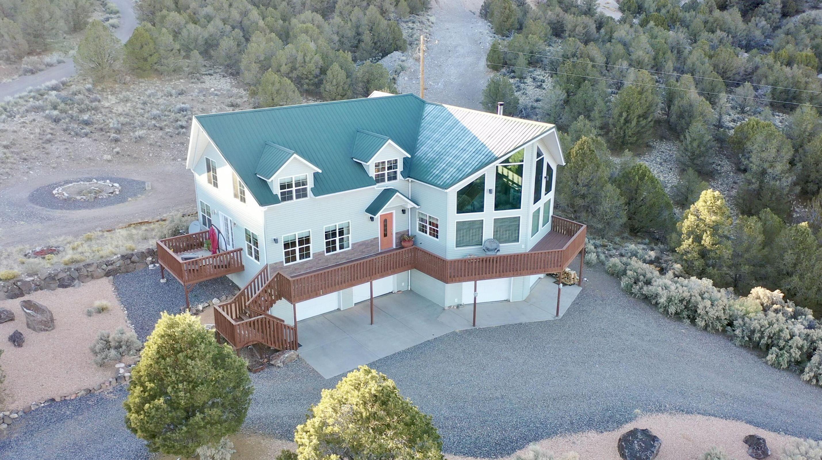 VIEWS!! VIEWS!! VIEWS!! Welcome to your new home where nature, wildlife & the STUNNING VIEWS will surround you. This home is within minutes to Bryce Canyon National Park which gives access to many trails for biking, hiking, horseback & OHV riding. Just 5 miles South of the town of Panquitch. Close to Henry Mountains, Casto Canyon & Red Canyon. Sevier River runs just below you across Hwy 89. Sit by the campfire or on the front porch to be mesmerized by the dark skies & stars. Plenty of room to add a shop or barn. No HOA and you have animal rights with almost 10 acres to enjoy with no close neighbors. Truly a home where you can enjoy the great outdoors, peace & quiet.