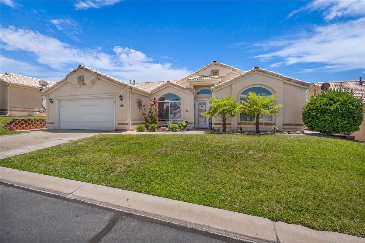 Thoughtfully designed with independence, comfort, and ease of living in mind, this exceptional home offers seamless wheelchair accessibility throughout without compromising style. Located in a charming 55+ community, this 3-bedroom, 2-bathroom home features a spacious open-concept floor plan filled with natural light, soaring ceilings, and functional living spaces. Accessibility features include true single-level living with no steps or stairs, wide hallways and doorways, a beautifully updated kitchen with lowered countertops, roll-in showers, accessible bathrooms with durable epoxy flooring, and thoughtful design elements that enhance everyday mobility. Step outside to a private, fully enclosed backyard where beautiful valley and mountain views create the perfect setting to relax or entertain. The community center is just a short distance away and offers outstanding amenities, including a pool, spa, pickleball courts, gathering areas, and more. Homes offering this level of accessibility are exceptionally rare. Blending thoughtful design with everyday comfort, this property presents a unique opportunity for greater freedom and independence while being just minutes from parks, paved walking trails, shopping, dining, and other everyday conveniences. Buyer/buyer's agent to verify all information.