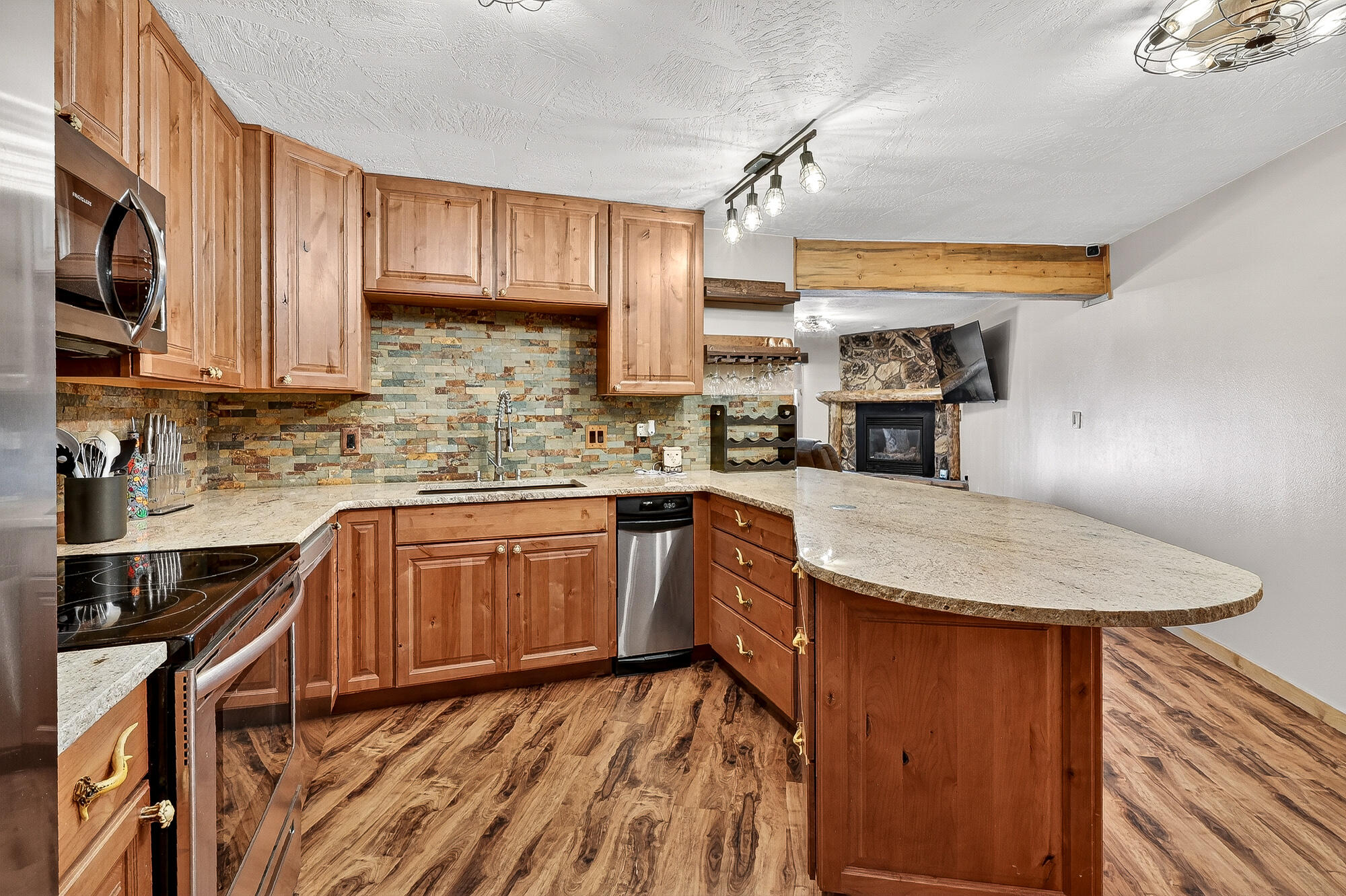 Welcome to this beautifully updated 1-bedroom, 1-bath condo located in the  Timbernest community in Brian Head. With 703 square feet of thoughtfully remodeled living space, this mountain retreat blends comfort, style, and functionality. Inside, you'll find brand-new cabinets, countertops, sink, and a stylish backsplash in the kitchen, along with a new refrigerator and an all-in-one washer/dryer. The living area features new luxury laminate flooring, modern light fixtures, a gas fireplace with a custom wood mantle, and a remodeled bathroom with a refreshed shower. An ON-DEMAND GAS HOT WATER HEATER ensures efficiency and comfort year-round. Step outside onto the large new Trex deck, where a unique Plexiglass cover opens in the summer/ closes in the winter! LARGE PRIVATE GARAGE PARKING SPOT THAT CAN HOLD A TRUCK! This unit also includes a private assigned enclosed parking space for added convenience. Pets allowed for owners too!

Located near a scenic paved walking trail, you'll have easy access to the heart of Brian Head, making it simple to enjoy local shops, dining, and seasonal activities. Whether you're looking for a weekend getaway or a year-round residence, this condo offers the perfect mountain lifestyle.