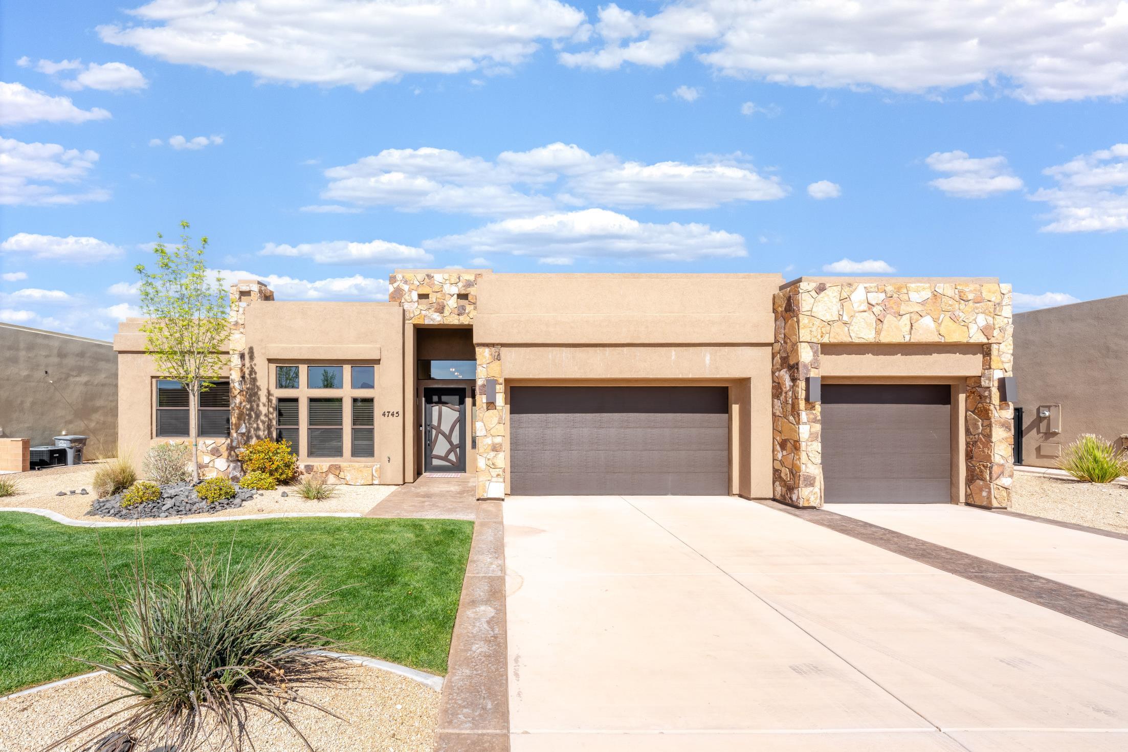 This spacious three-bedroom, 2.5 bath residence features tall ceilings and an open floor plan, perfect for modern living and entertaining. Enjoy the red rock views from your kitchen and backyard while practicing your putting with the putting green. This home boast numerous upgrades, including a cozy gas fireplace, automatic blinds, and big walk in closets. For your convenience, the property also includes Three-car garage, providing plenty of space for vehicles and additional storage.