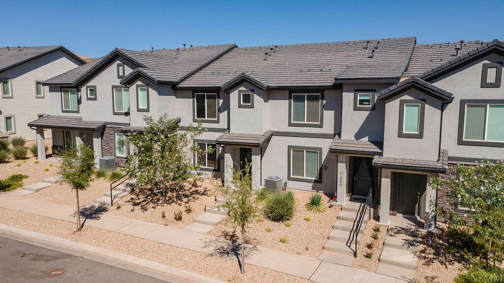 ***Seller to contribute $5,000 towards closing costs with full price offer.

***Mounted living room TV included.

Discover this quality-built 3-bedroom, 2-bath townhome with a 2-car garage in the desirable Long Valley community. 

Thoughtfully designed layout, featuring a bright open living space and a well-appointed kitchen with a large center island, quartz counters, ample pantry storage, stainless steel appliances, durable laminate flooring across the main level, and a customized bedroom with a beautiful woodwork wall design. 

Residents enjoy exceptional amenities including resort-style pools, hot tub, pickle-ball courts, an 18-hole putting course, splash pads, and more--perfect for relaxation and recreation. An ideal starter home or excellent second-home investment opportunity. Just a few minutes drive to Sand Hollow State Park and Reservoir. 

*Buyer is responsible to verify ALL listing information including but not limited to: HOA dues/fees, HOA inclusions, billing companies, transfer fees, acreage, square footage, etc.*