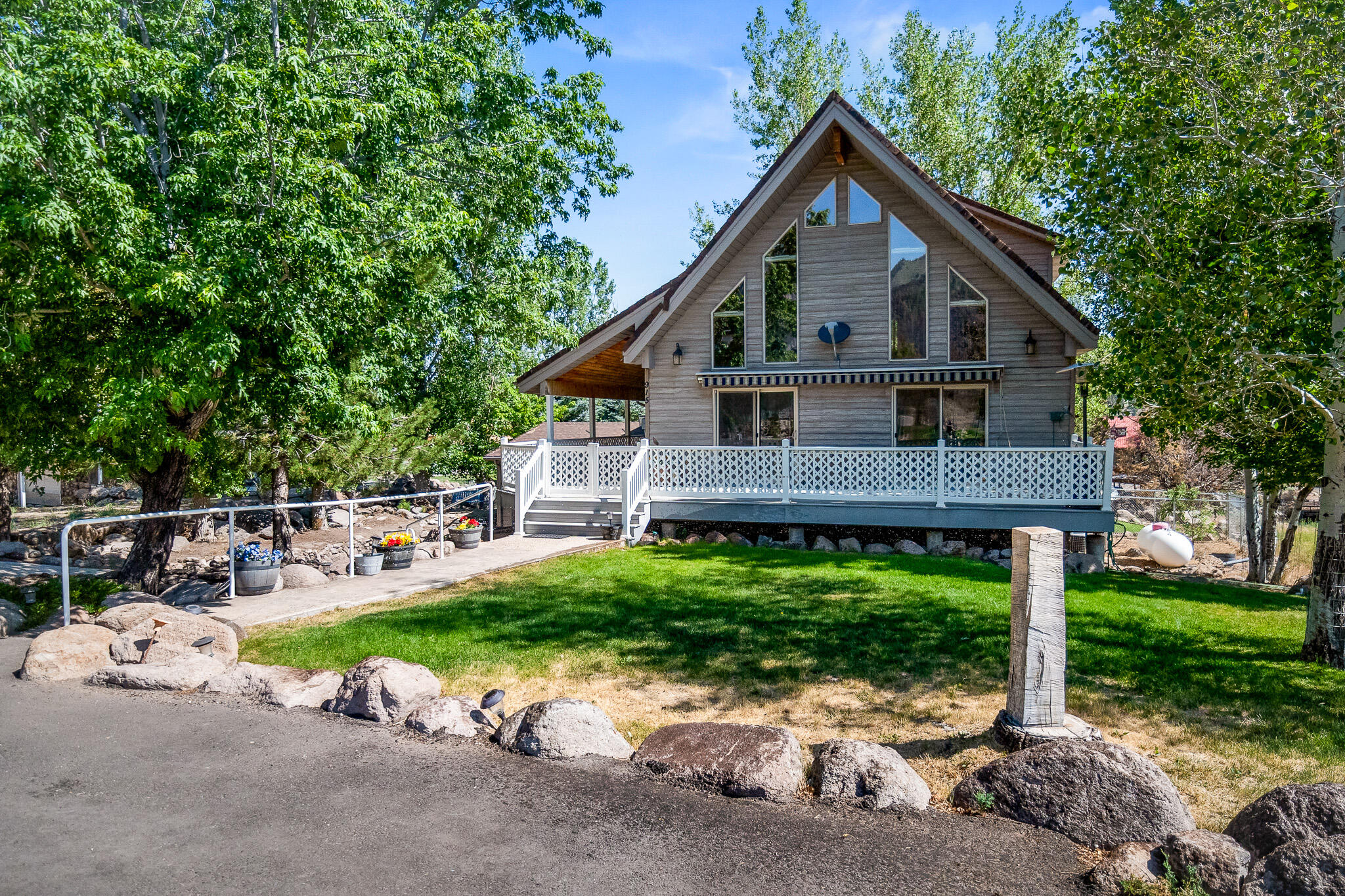 Escape the heat and own a piece of Pine Valley. Located at the top of the highly desirable Pinestead neighborhood. This well-maintained cabin is nestled among mature trees and surrounded by beautiful newer homes, offering the perfect mountain retreat for year-round living or a weekend getaway. The thoughtful floor plan flows seamlessly, with the great room opening to a spacious front deck where you can enjoy cool mornings with your beverage of choice and relaxing evenings beneath the pines.

With bedrooms and bathrooms on all three levels, there's plenty of space for family and guests to spread out comfortably. The lower-level theater room is ideal for movie nights, game days, and gathering with friends, while the oversized garage and backyard shed provides ample room for vehicles, outdoor gear, and additional storage.

Enjoy peaceful walks, fresh mountain air, scenic views, and the small-town charm that makes Pine Valley such a sought-after destination. With year-round access and located just 45 minutes from St. George, you'll feel miles away from the summer heat while still enjoying convenient access to town.

Whether you're searching for a full-time mountain home or the perfect getaway retreat, this property offers the best of Pine Valley living.