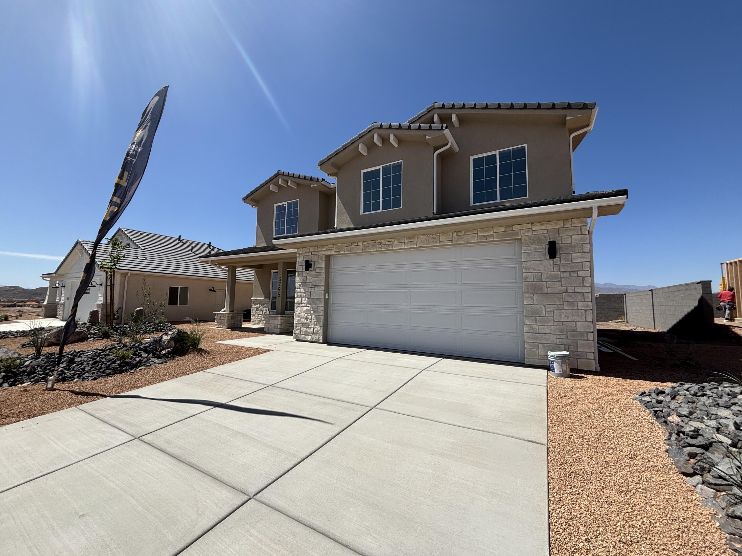Welcome to your NEW HOME in Legacy at Sand Hollow. Introducing our popular Magdalena floorplan- featuring 4 bedrooms, 2.5 bathrooms, a loft AND flex room! 2 car tandem garage for extra storage or outdoor toys! Just minutes from Jellystone water park, and Sand Hollow Reservoir, where adventure and serenity meet. Carefully tucked away for privacy, yet only 10 minutes from your nearest grocery store and everyday essentials, this community offers the best of both worlds. With low HOA fees, and thoughtfully designed homes, it's an ideal place for anyone seeking the best that Southern Utah has to offer. All Visionary Homes are built with 2x6 framing and R-50/R-19 insulation for extra heat-cooling efficiency. Call Shannon and ASK ABOUT OUR PREFERRED LENDER INCENTIVE and schedule your private showing today.