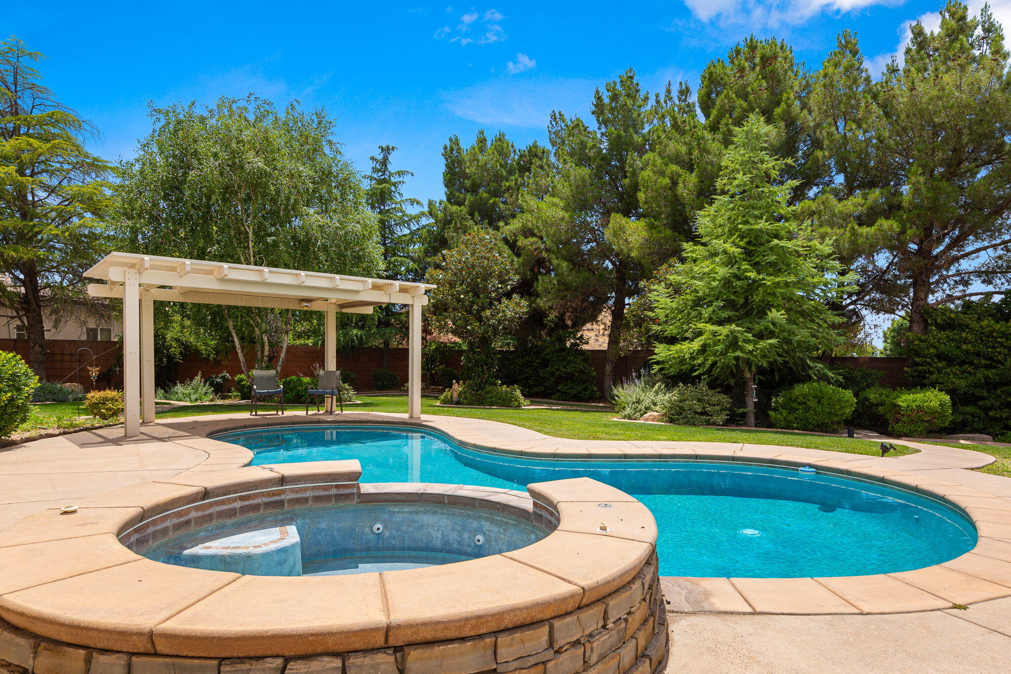 Comfort meets timeless charm in this beautiful home featuring a sparkling pool and relaxing hot tub, perfect for enjoying every season. Inside, you'll find expansive windows that fill the home with natural light, hard surface flooring throughout the main living areas, and a cozy fireplace that creates a warm and inviting atmosphere. Step outside to a beautifully landscaped yard surrounded by mature trees, offering both shade and privacy while creating the perfect setting for entertaining or unwinding at home. A rare combination of comfort, character, and outdoor beauty all in one inviting property. Bonus room upstairs could also be an oversized bedroom or entertainment room.
**Estate sales will be happening on the following days: Friday 5/29 and Saturday 5/30 8 a.m. to 2 p.m. 
Thursday 6/4/26 5 p.m.- 8p.m. 
Friday 6/5 and Saturday 6/6 8 a.m. to 2 p.m.