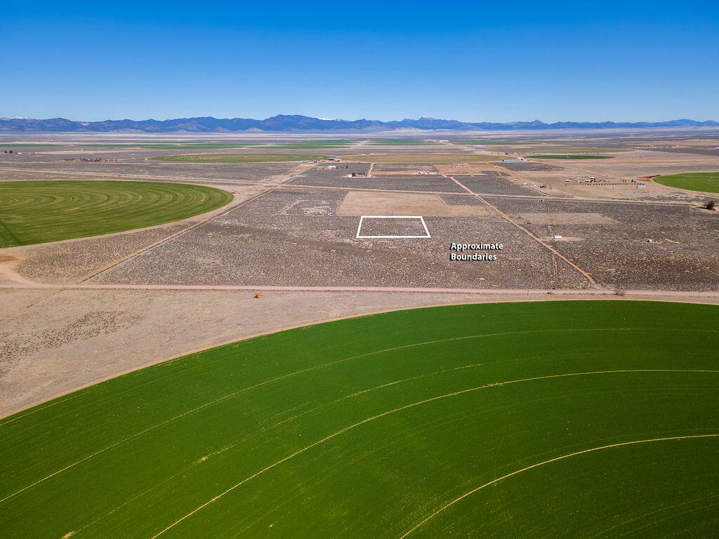 Incredible Homestead opportunity on this acreage that features perfect level ground with gorgeous views! The surrounding rolling hills are quiet and peaceful and the night skies are amazingly dark with the contrasting sparkling stars! If you are looking to ''get away from it all'' this is it! The parcel comes with 1 acre foot of water with  water right # 71-6048 with a priority date of 1945. Water is approved for a well on the land and has well cards issued.  Power is behind the parcel but it may be a great spot for off-grid living. Septic will have to be installed by the buyer. This property is permitted for a short term rental use and RV living.