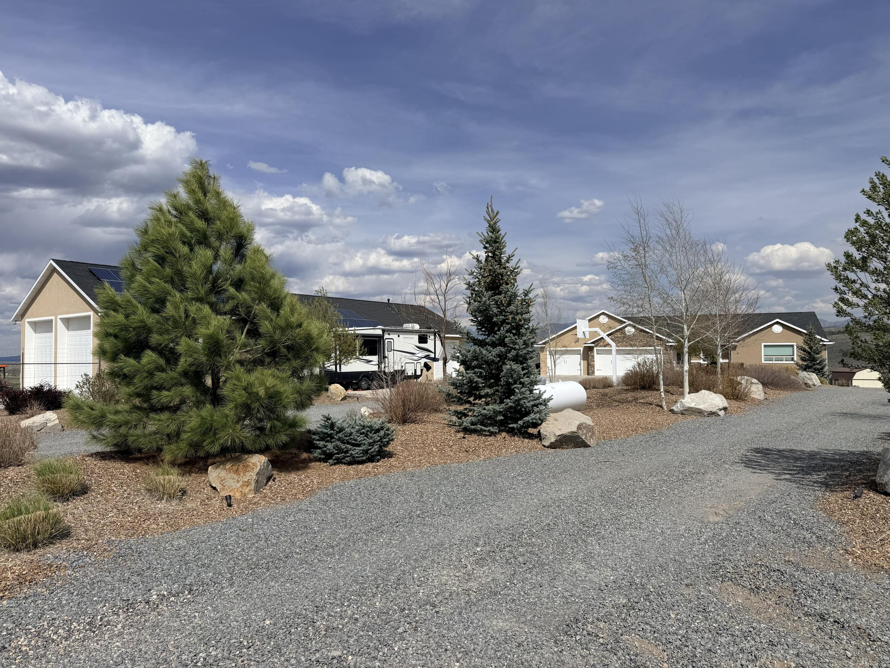Perched above the town of Panguitch, this stunning property offers 360 degree views, abundant open space, and generous acreage. The custom home is complemented by a large detached garage and workshop-perfect for hobbies, storage, or creative pursuits.