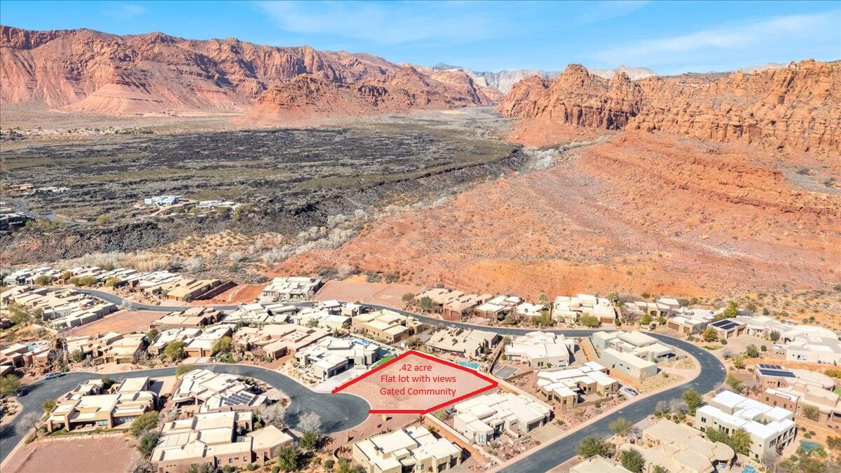 Incredible residential building lot located in the prestigious & gated Cliffs of Snow Canyon subdivision.  This lot offers all the amenities of Entrada without the required membership fees.    This .42 are lot boasts amazing red rock & kachina cliffs views and is conveniently located in a quiet cul-de-sac.  The lot is flat and ready to build on.   Come design your dream home on one of the last remaining lots in the Cliffs.  Seller also has custom plans available designed by McQuay architects.