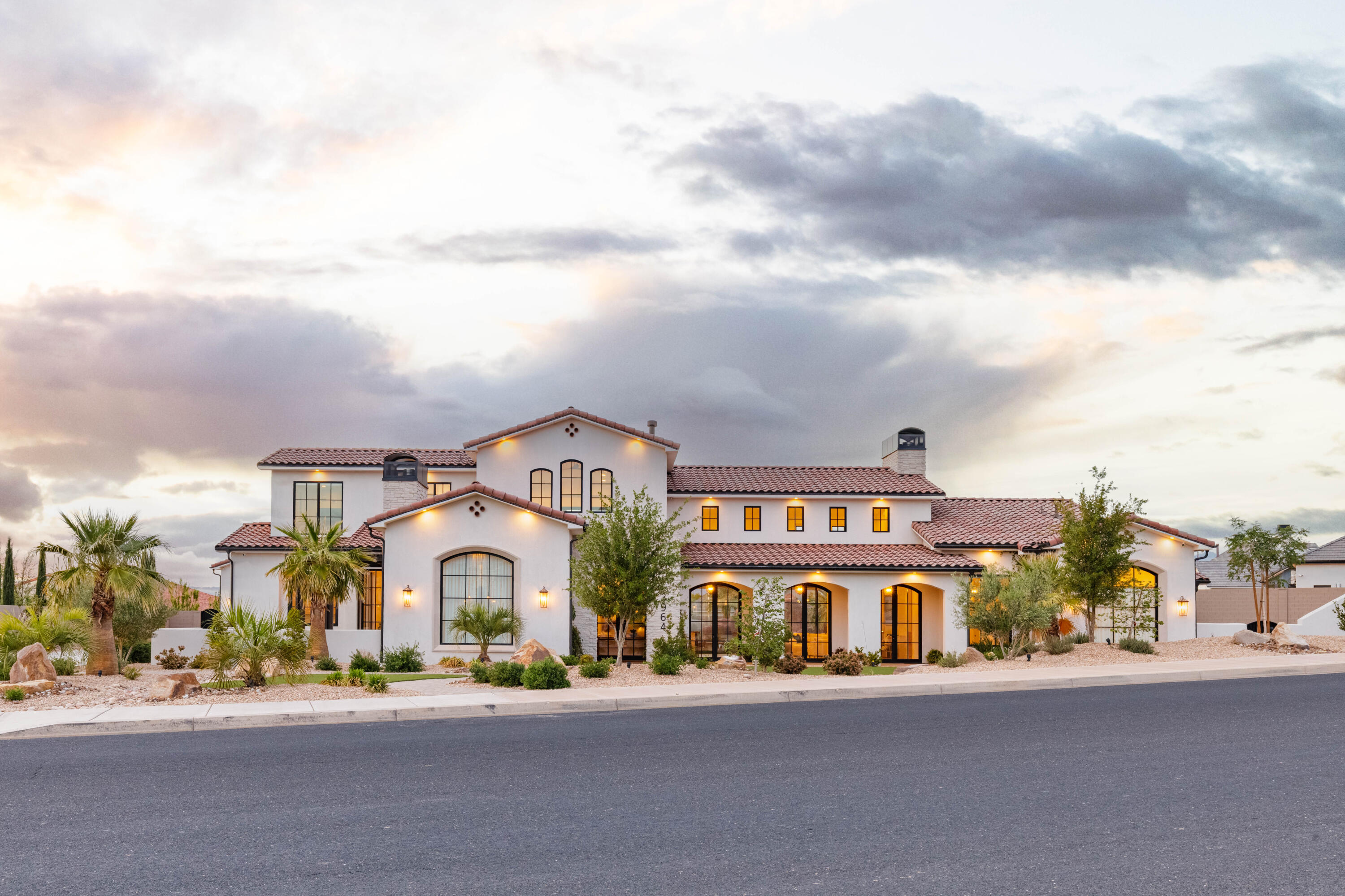 Mediterranean-Inspired Luxury in Little Valley: Built in 2023 by RL Wyman, this stunning custom residence sits in the highly sought-after Little Valley area and instantly welcomes you with a Mediterranean-inspired façade and vaulted ceilings. Flooded with natural light, the home's thoughtfully designed interior celebrates high-end finishes and timeless style, while the north-facing backyard treats you to unobstructed views of Pine Mountain. Inside, the collaboration between architectural craft and Becky Owens Design shines through every detail. The chef's kitchen is a showpiece: two quartzite heated islands, top-of-the-line appliances, and an effortless flow for indoor-outdoor living via collapsible sliders that open to the zero entry pool--and to unforgettable entertaining spaces for family and friends. Set on a generous 0.91-acre lot, no detail was left undone. The outdoor oasis features resort-grade amenities for every occasion: a cold plunge for quick refreshment, a sauna for relaxation, a dedicated workout room, and a detached guest casita for guests or extended family.  For serious play, there's an in-ground professional trampoline, plus a 25x50 pool with a 10x20 hot tub, ensuring year-round enjoyment and social gatherings beneath the desert sky. Retreat to the primary suite wing, where the luxury continues in the bathroom with heated floors and shower sprayers. Convenience is at your fingertips with a GE Profile all-in-one washer/dryer, complemented by a clothes steamer, making daily routines feel effortless.  This home blends Mediterranean charm with modern luxury, crafting a lifestyle that's both elegant and inviting. Don't miss the opportunity to experience the architectural finesse, the attention to detail, and the unparalleled outdoor entertainment this Little Valley gem offers.No detail was left undone in this nearly one-acre slice of paradise. If you're seeking a turnkey, resort-style home with mountain views, sun-filled rooms, and an entertainer's dream yard, this is the one. Schedule your private tour today and experience the lifestyle this home affords.  Furniture package available.  Buyer to verify all information.