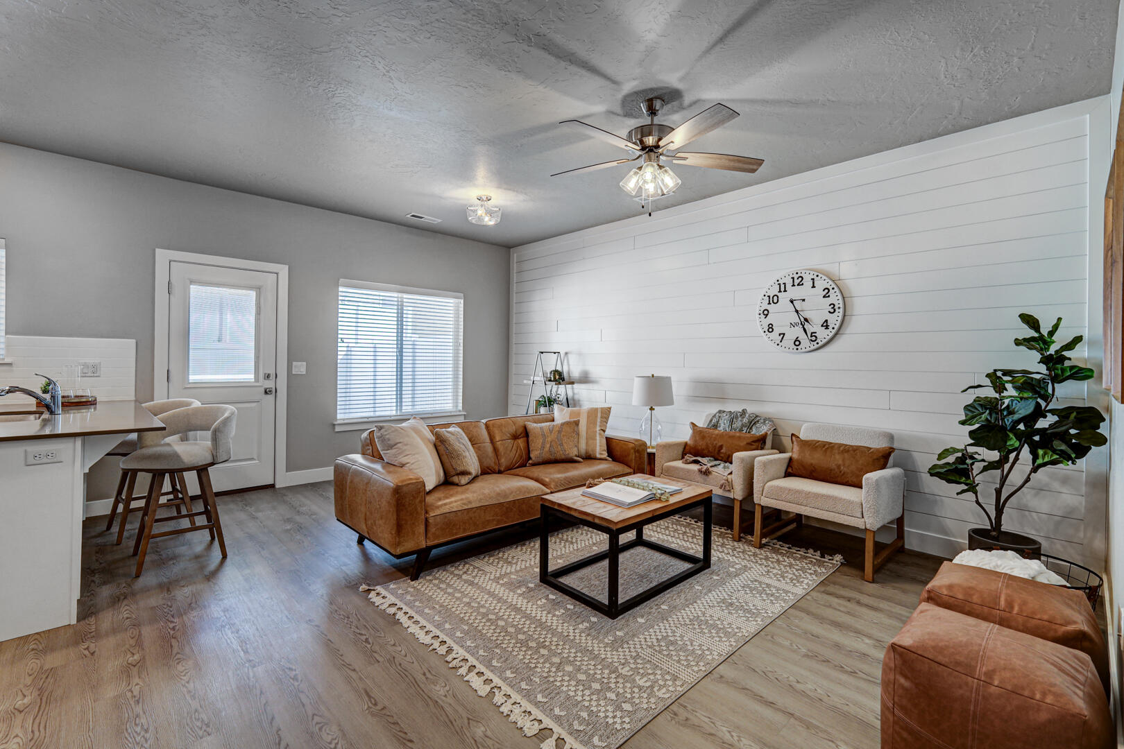 Located in the welcoming Cedar Bend community in Cedar City, this move-in ready home offers easy, stress-free living in a great location close to schools, parks, shopping, and everyday conveniences. Whether you're a first-time home buyer, looking for a low-maintenance 2nd home, or searching for a smart investment opportunity, this home checks all the boxes.

Inside, you'll find 3 bedrooms, 2.5 baths, stylish LVP flooring, quartz countertops, subway tile backsplash, soft-close cabinets, and stainless steel appliances that bring a clean, modern feel throughout the home. The open layout creates a warm, family-friendly atmosphere perfect for gathering, relaxing, or entertaining.

Step outside to enjoy the private fully fenced yard and covered patio--ideal for kids, pets, summer BBQs, or quiet evenings at home. With thoughtful upgrades, modern finishes, and a location that makes everyday living simple, this Cedar Bend home is ready for its next chapter.