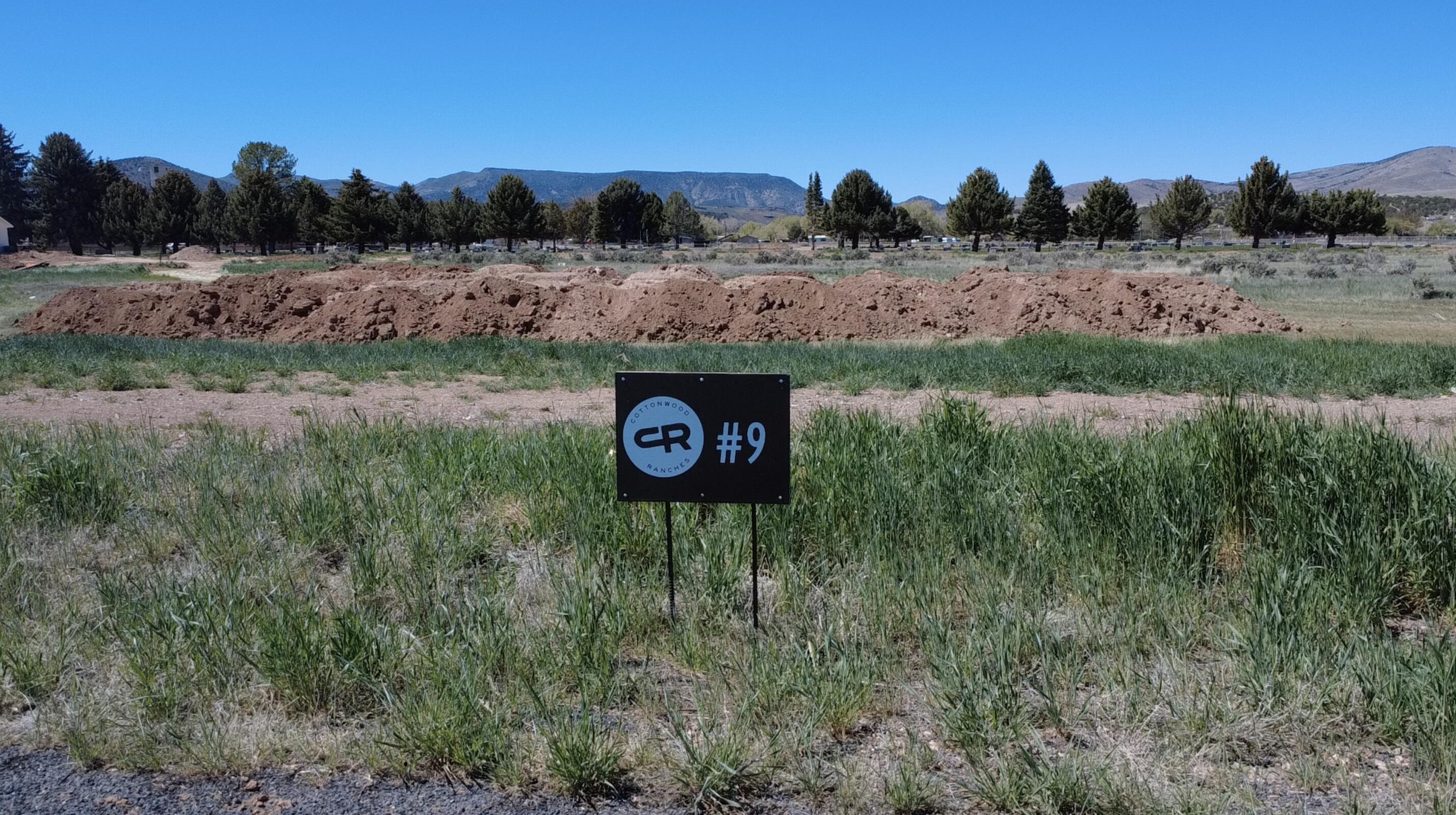 Come experience country living at its finest in Cottonwood Ranches--Enterprise's newest premier equestrian subdivision. Designed with horse lovers and those seeking space in mind, this community offers large lots ranging from 0.5 to 1.5 acres.

Lot #9 features 1.25 acres of flat, usable land--perfect for building your dream home, barn, and corrals. Located within Enterprise city limits, utilities include water, power, fiber optics, and natural gas, with septic required for sewer. Up to 5 large animals are permitted.

Enjoy the charm of Enterprise, a self-sufficient rural community offering grocery stores, restaurants, schools, medical services, and more--all while being just 40 minutes from St. George and Cedar City. Bring your own builder and create your ideal lifestyle. Impact fees are approximately $13,000.