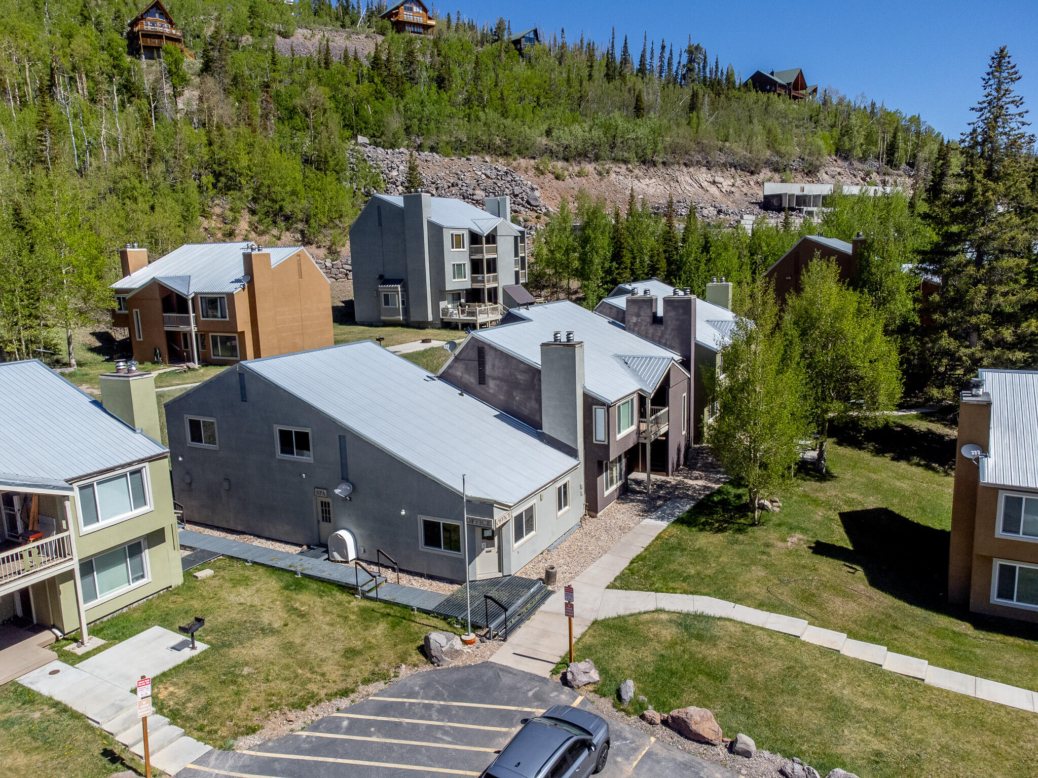 Step right into mountain living with this fully furnished 2BR/1BA ground-floor condo located directly across the street from the Giant Steps ski lift in Brian Head, UT. Perfect for a rental or private retreat, this turnkey unit features a large kitchen and an inviting living room anchored by a cozy corner fireplace. Step out onto your private patio to enjoy the fresh alpine air. Storage is a breeze with plenty of closet space for all your gear. After a day on the slopes, unwind in the complex spa and sauna. Best of all, firewood is included in your HOA dues! Don't miss this ultimate, hassle-free winter and summer escape.