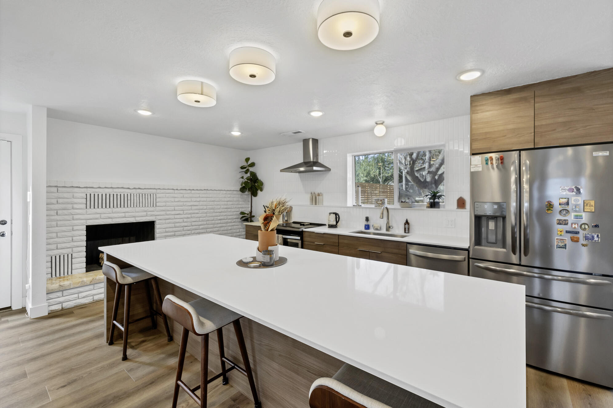 This charming 1954 Mid-Century Modern home is a must see! The property was thoughtfully remodeled in 2021 by local designer & contractor, Tiffany White, to bring intention and function back to this timeless home. The open floor plan, natural light and private, spacious backyard make this home an entertainers dream.