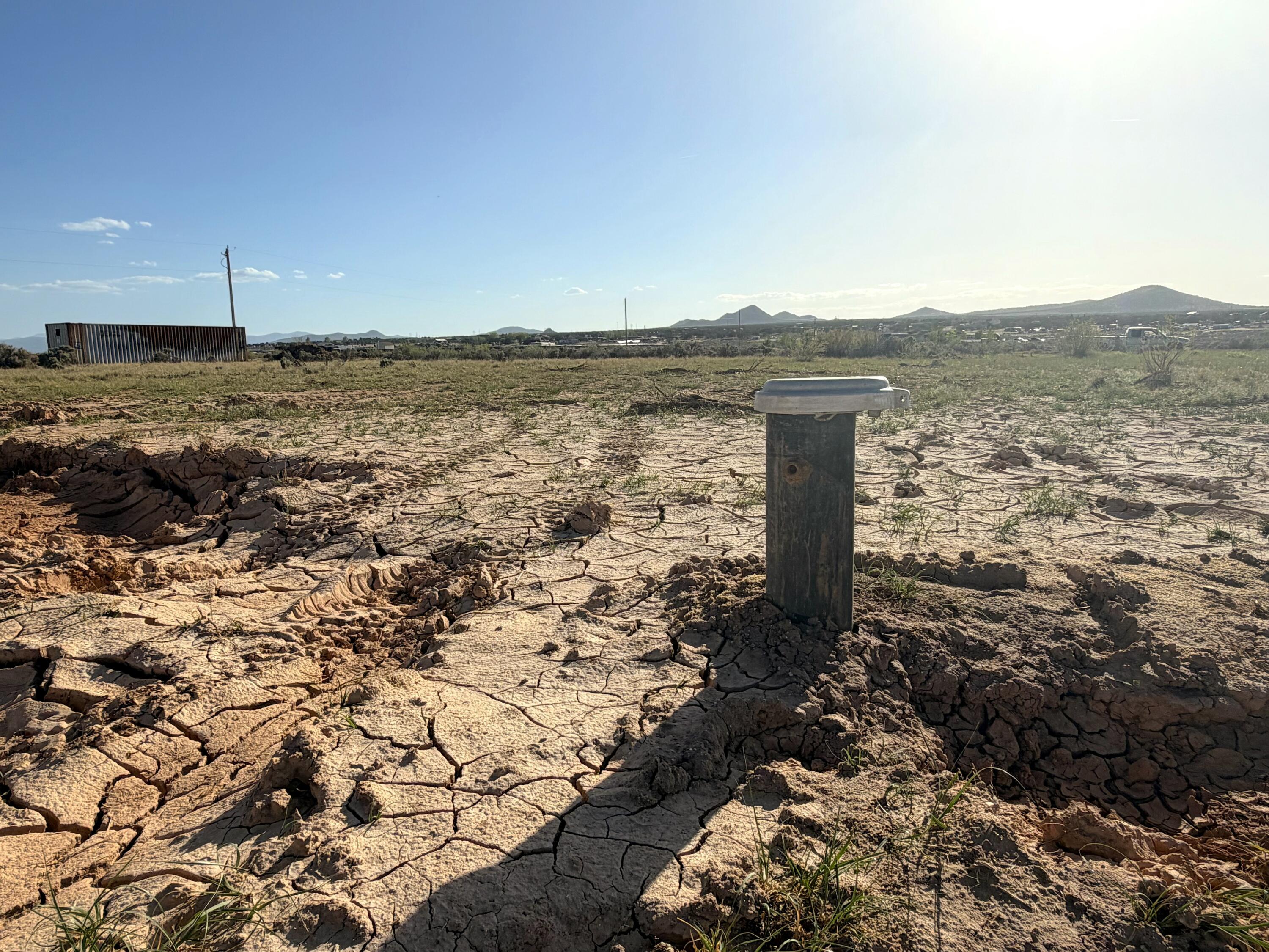 Peaceful 1.25 acres in Cedar Valley Acres with views of Three Peaks. Including 1 acre foot of Water Rights (from WR # 73-4788) and a well at the NE corner of the property drilled in 2026. A 50/50 Well-Agreement will be made with the neighboring parcel #D-0456-0504-0000, also for sale with it's own 1 Acre Ft Water Right. An electrical transformer is located at the NW property corner. It is zoned Residential Single Family, has Animal Rights, an Accessory Dwelling Unit is permitted and Nightly Rentals are allowed. No HOA! Seller may consider a discount for the purchase of both properties together. Storage container will be removed prior to sale.