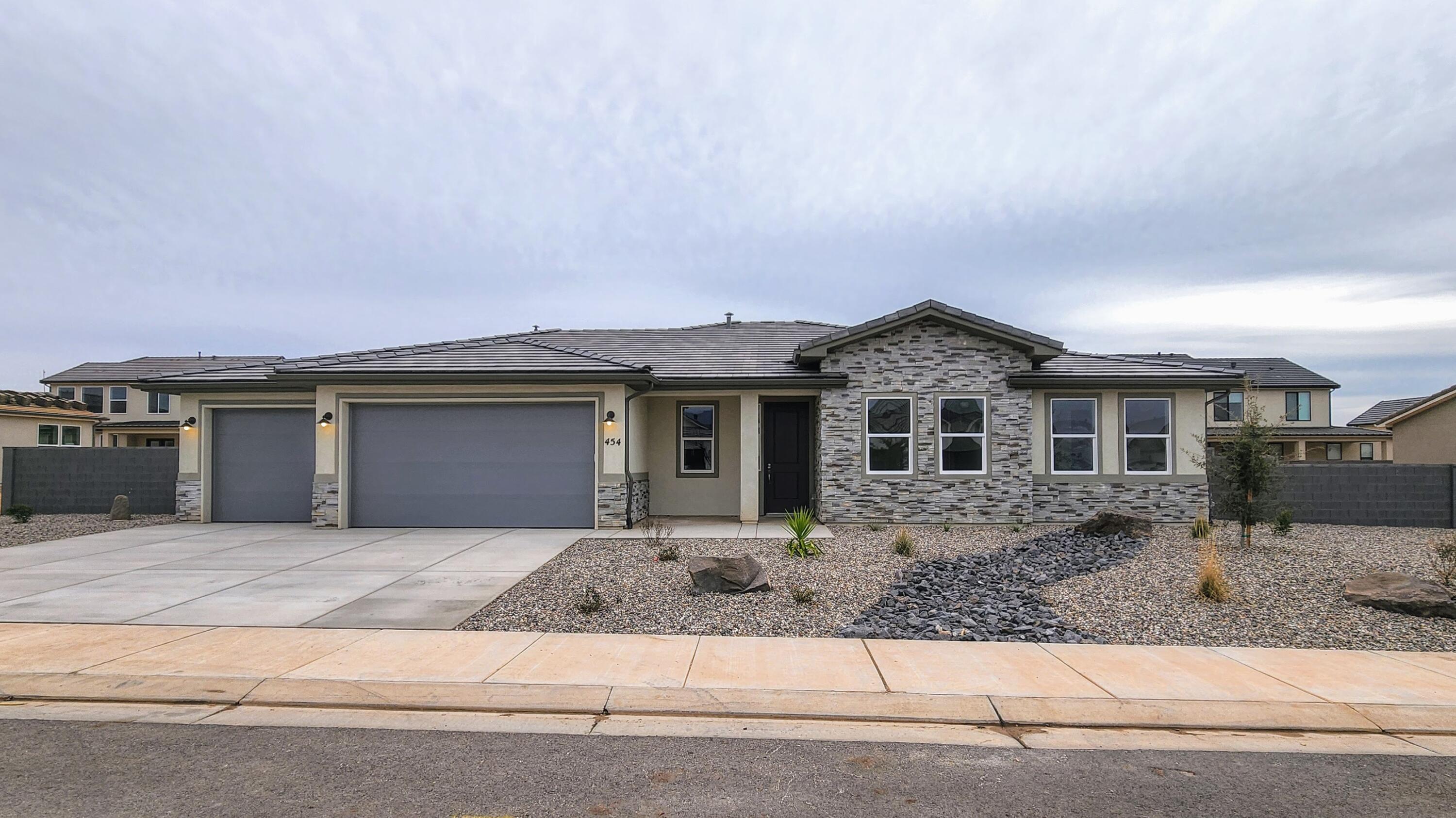 New Construction in sought-after area near Crimson Cliffs High School! Builder is offering special financing when using their preferred lender. The inviting layout of this exceptional Melody home makes entertaining easy. Highlights include a spacious great room, an open dining area and a well-equipped kitchen featuring a generous walk-in pantry and center island. The lavish primary suite boasts a private bath and an oversized walk-in closet, and two additional bedrooms offer ample space for family and guests. Includes a tandem 4 car garage for toys. Buyer to verify info.