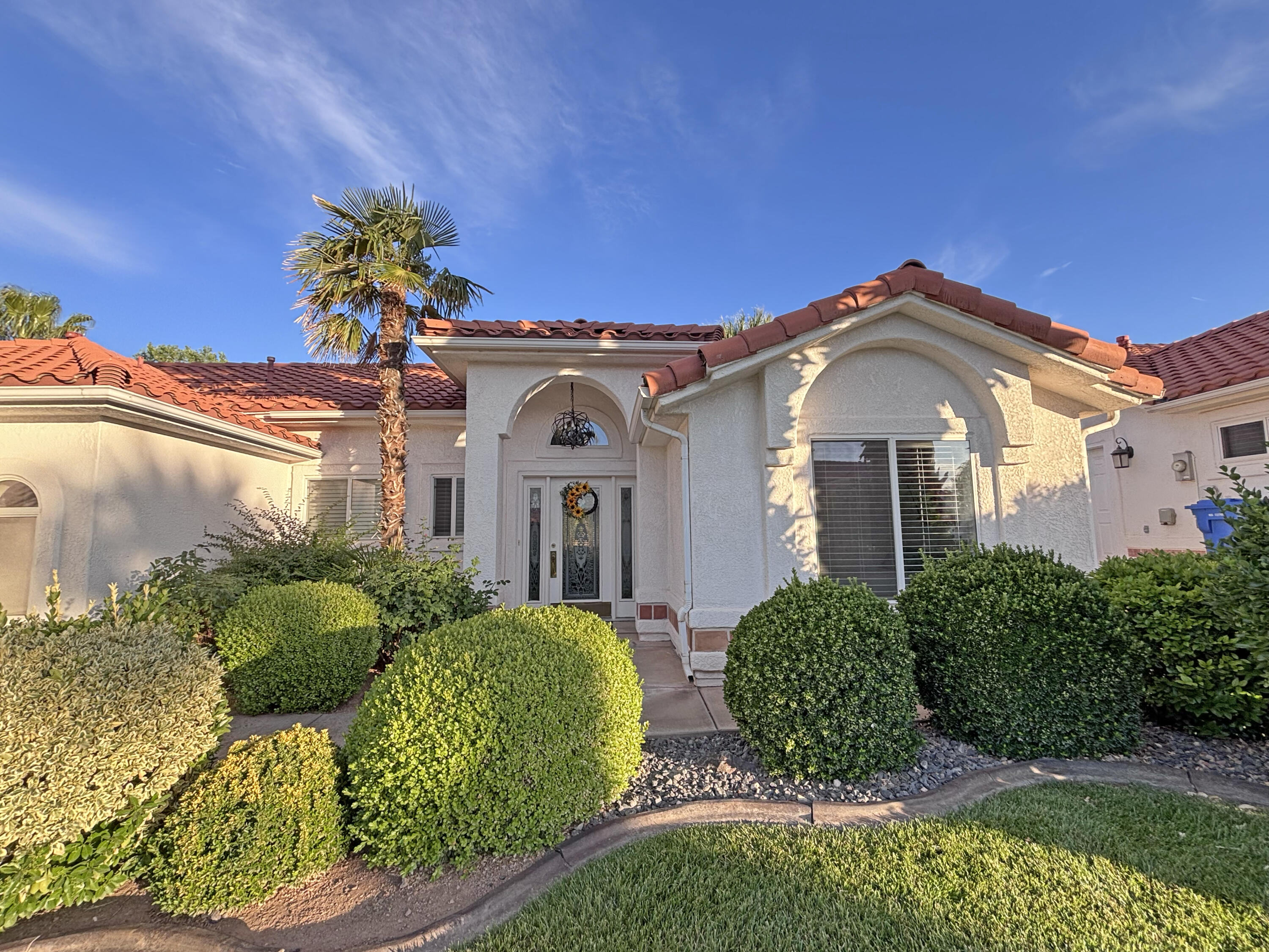 Tucked within one of St. George's popular golf course communities, this darling 3-bedroom home offers the perfect blend of relaxation, convenience, and Southern Utah charm. Whether you're searching for a second home or low-maintenance full-time residence, this home is designed for easy living and endless enjoyment.
Step inside to inviting living spaces with  vaulted ceiling's, filled with natural light and a warm, welcoming feel. The thoughtful floor plan offers comfortable gathering areas, spacious bedrooms, and effortless indoor-outdoor living. Enjoy peaceful mornings, sunny afternoons, and beautiful desert evenings just moments from golf, trails, dining, and all that St. George has to offer. Located across from the pickleball courts & clubhouse/pool the location can't be beat!