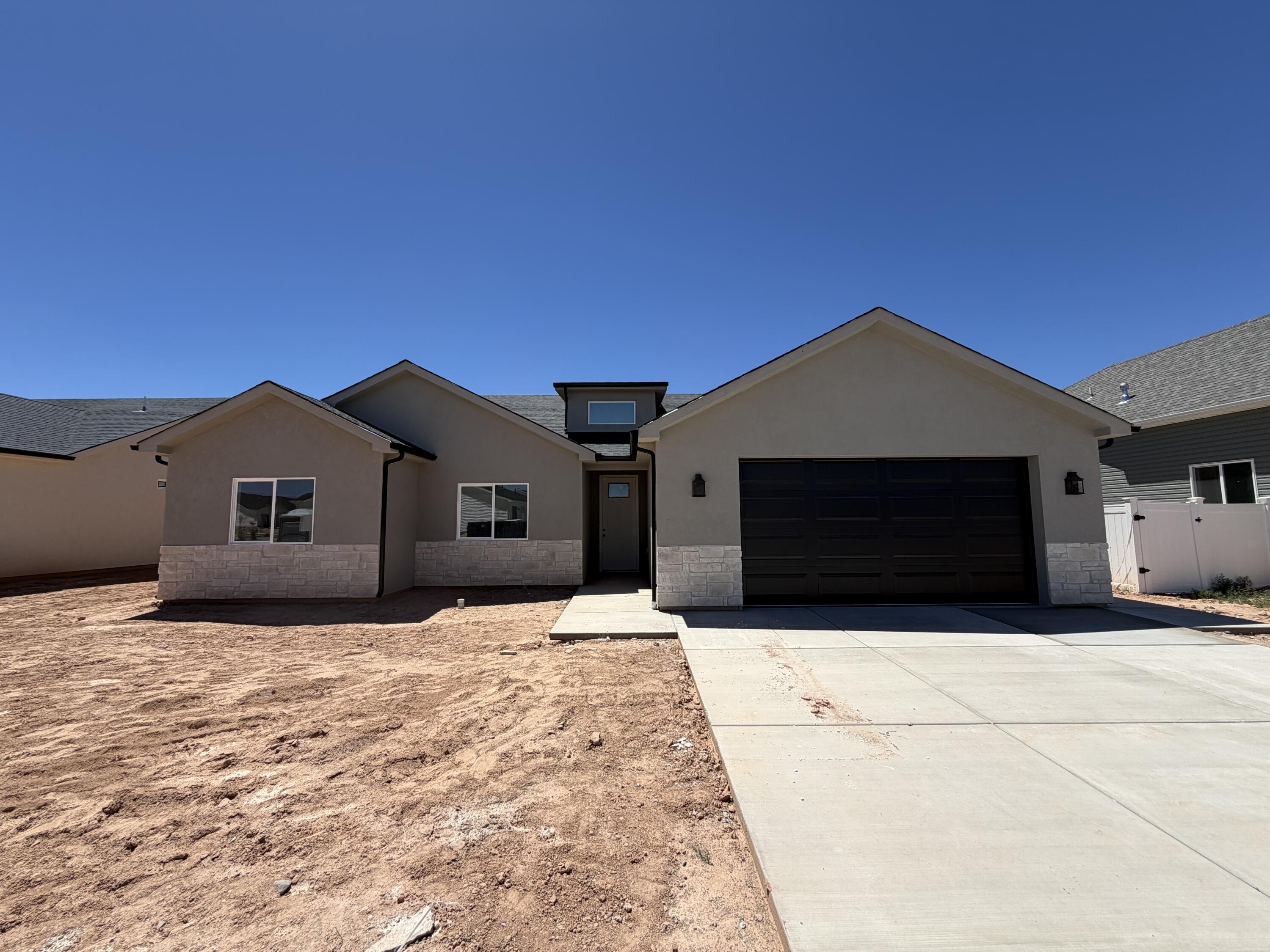 Welcome to the brand new Pointe West Subdivision! This beautiful new construction home offers the perfect blend of peaceful living and modern convenience, located just minutes from town while still surrounded by open space. Enjoy stunning views and added privacy with farm fields directly behind the property, creating a quiet country feel. Thoughtfully designed with quality craftsmanship, modern finishes, and spacious living areas throughout. Don't miss the opportunity to own a brand new home in one of the area's growing communities while enjoying the beauty of wide-open surroundings.