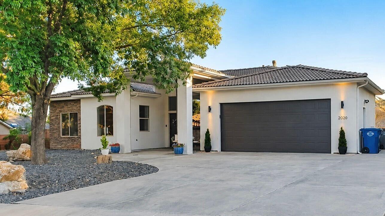 Welcome to this beautiful, clean, modern home in the Knolls at Little Valley! A desirable neighborhood with no HOA. Situated on a spacious .48 acre lot with stunning red rock and city views with RV parking in addition to the 2-car garage. Inside, you'll find an open and inviting floor plan with plenty of natural light, a well-appointed kitchen, and shiplap walls with stunning finishes. The basement with a second kitchen, theatre room, living room and bathroom creates space for guests or investment options with enterainment. 2 new  HVAC units (upstairs & basement) with warranty and brand new water heater with 5 year warranty. From the walkout basement you join a fully landscaped backyard against the mountain. Located just minutes from parks, hiking and biking trails, shopping, dining, and top-rated schools, this home truly has it all.