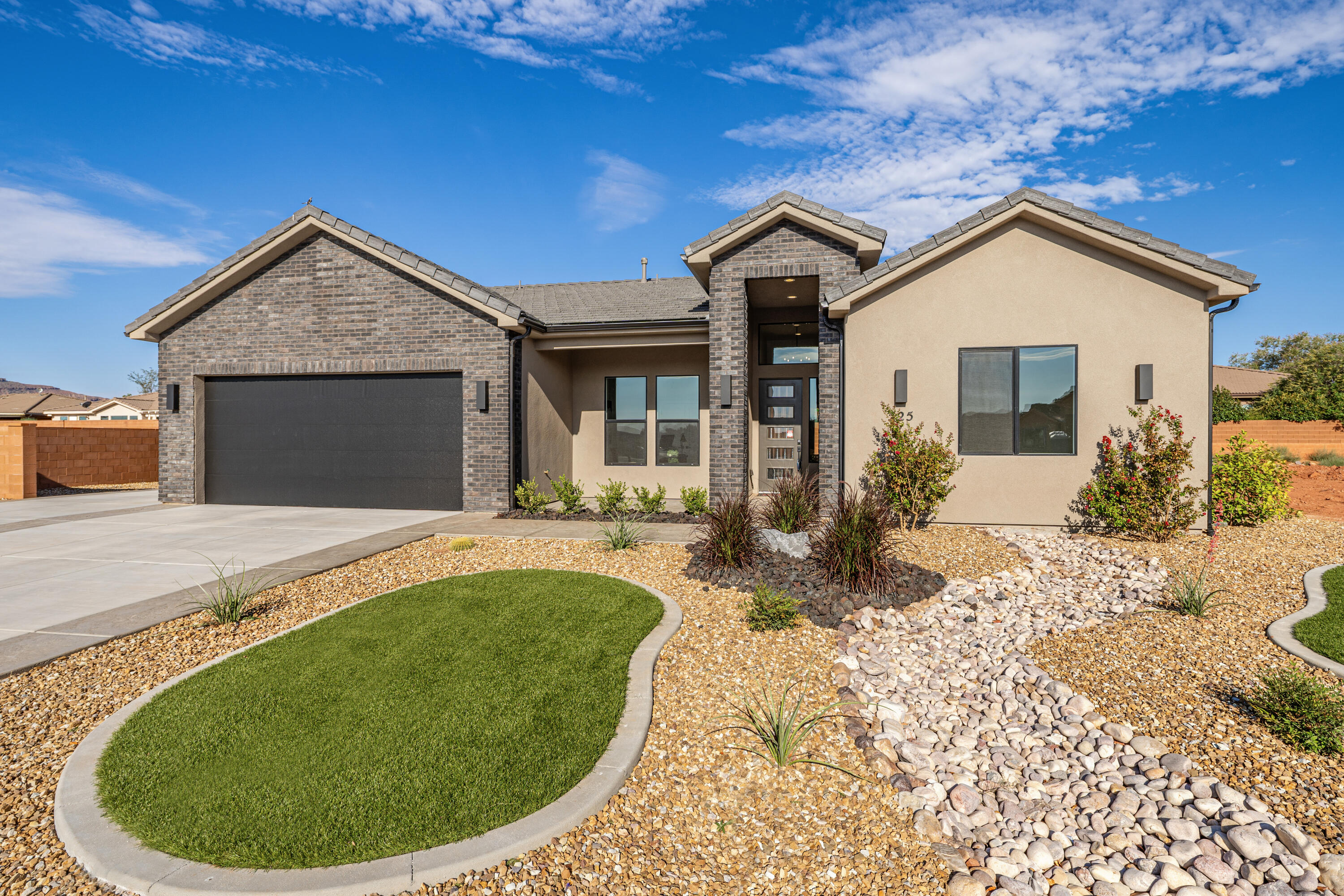 Completed New Construction. New neighborhood right off Main St. in Ivins! Beautiful Red Mountain View from the front bedroom, and back patio. Located in the heart of Ivins, Serenity Estates is a desirable, serene neighborhood.  This home is located on a quiet cul-de-sac, and has an open floor plan and plenty of windows!  Large RV pad on the side. Close to trails, Tuacahn Amphitheatre, Snow Canyon, and Gunlock Reservoir.