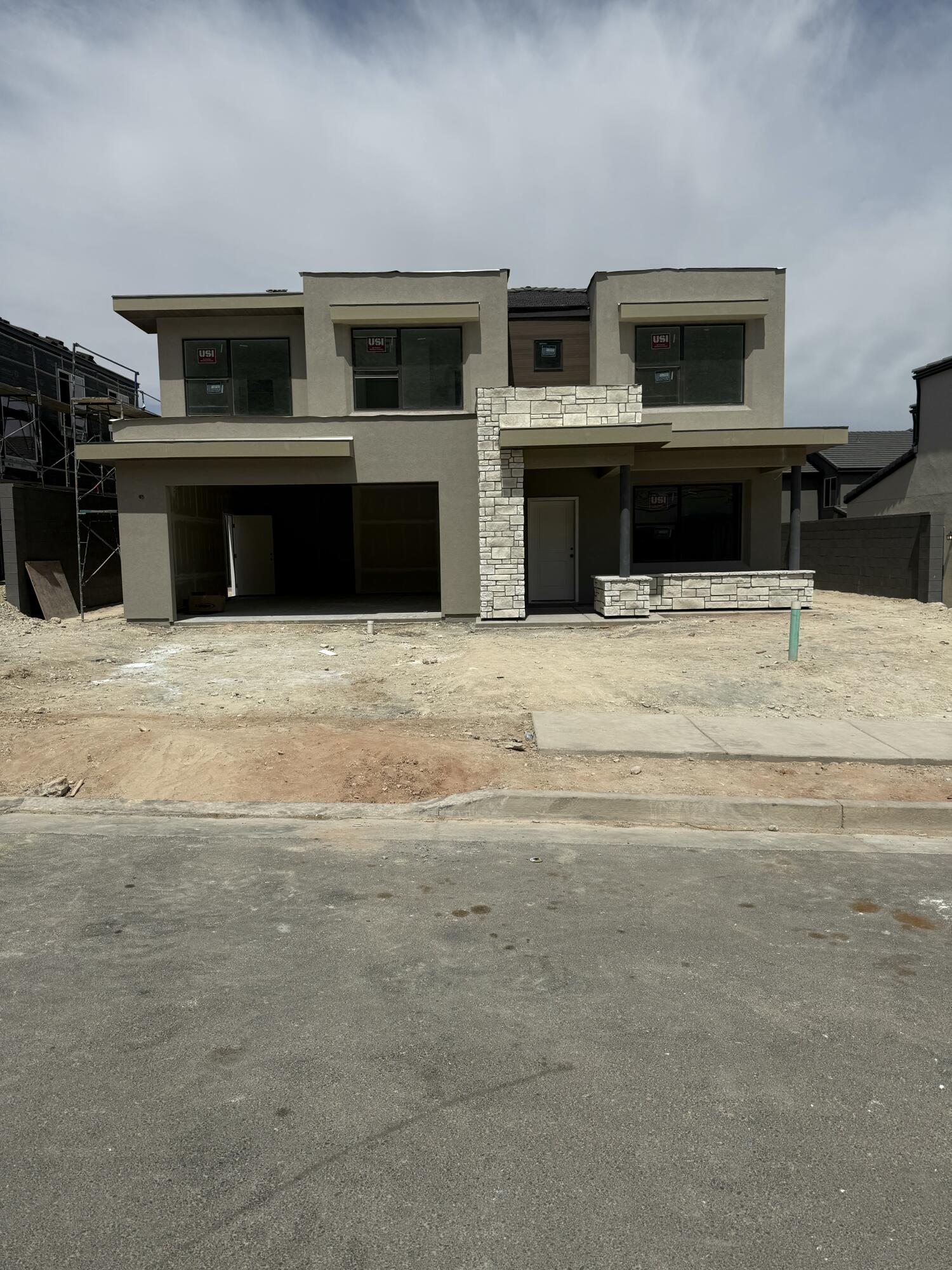 This NEW beautiful Desert Modern Palisade floorplan featured in the desirable community of Long Valley. You will enjoy an open floorplan that boasts a kitchen with generous pantry, a large kitchen island with breakfast bar, quartz countertops and laminate flooring throughout the main level. Enjoy our community pools, hot tub, pickleball courts, 18 hole putting course and more! Ask me about our generous home warranty and smart home package! **$7,000 towards closing costs when using DHI Mortgage. More... Actual home may differ in color, material, and/or options. Pictures are of a finished home of the same floor plan and the available home may contain different options, upgrades, and exterior color and/or elevation style. Buyer to verify square footage. No representation or warranties are made regarding school districts and assignments; please conduct your own investigation regarding current/future school boundaries.