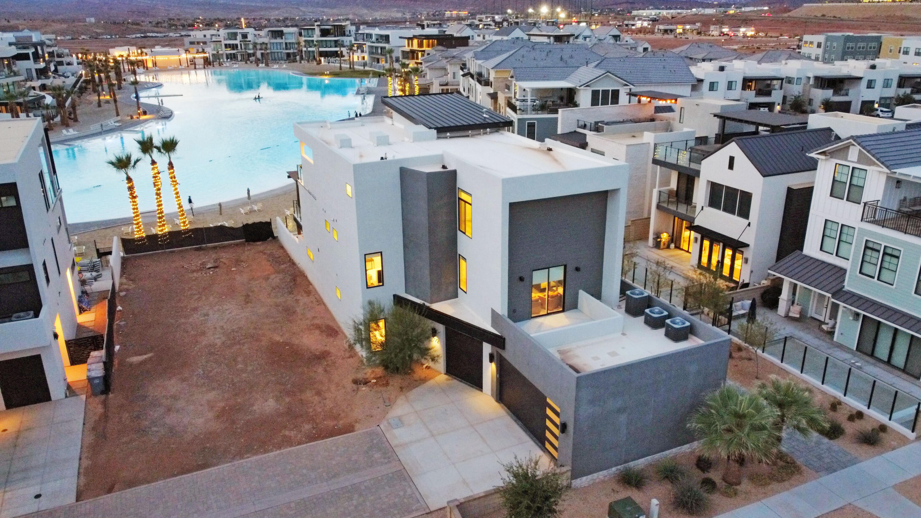Wake up to glass smooth water, white sand beaches, and relax at night watching panoramic sunset views across the lagoon. This premier lagoon front residence is positioned directly on the water with unobstructed views in one of the most sought after locations in St George. Designed as a true luxury vacation retreat, the home features extensive upgrades, high end finishes, and designer furnishings throughout. The exceptional waterfront placement and thoughtful design have contributed to a proven track record as one of the highest performing vacation rentals in all of Desert Color. Offered as a 1/4 fractional ownership, this is a rare opportunity to enjoy luxury lagoon front living while also benefiting from outstanding rental performance.