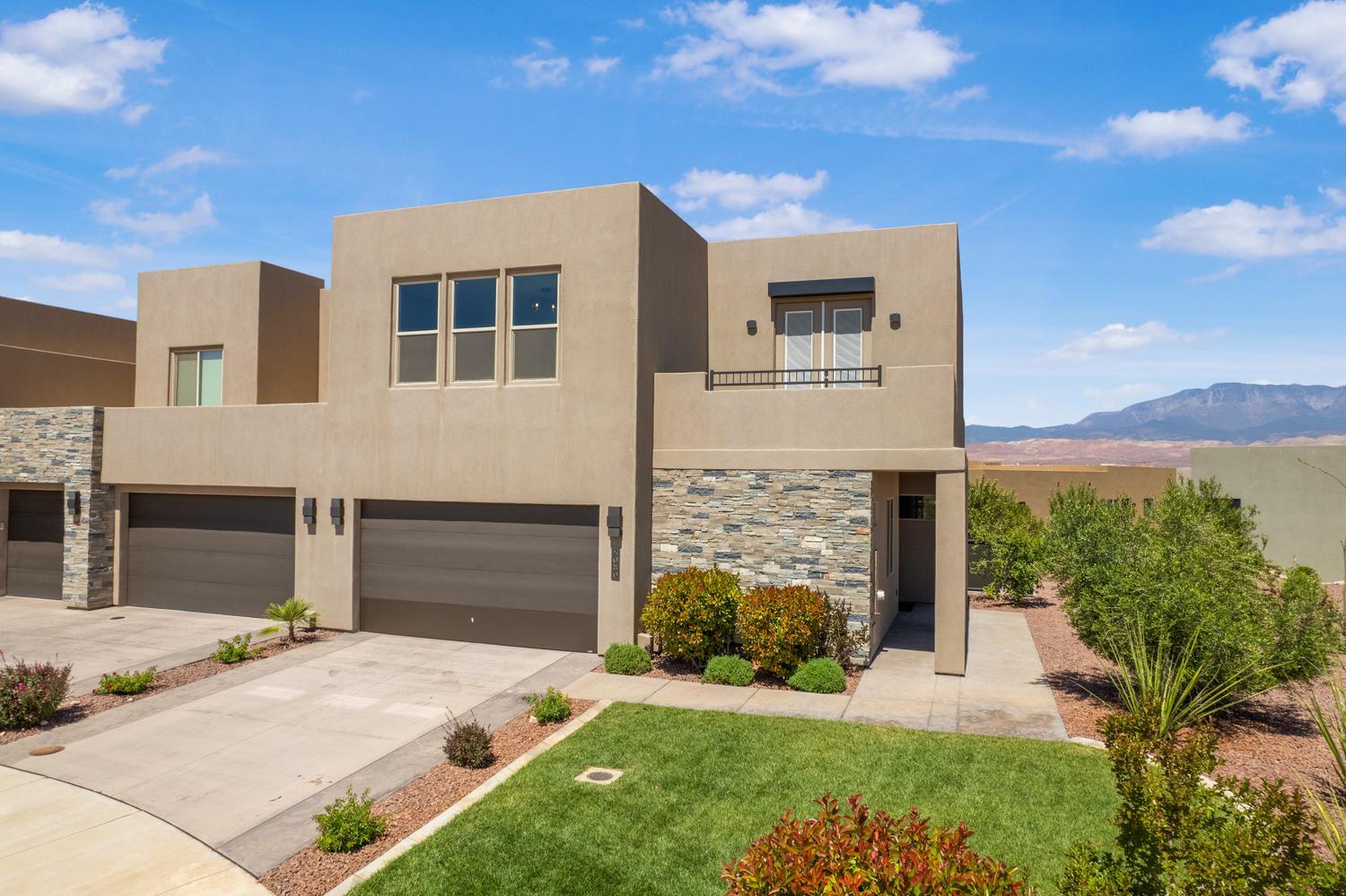 Exceptional 4-bedroom, 4.5-bath VACATION RENTAL in highly sought-after Tava Resort. One of the few curated vacation homes allowed, located minutes from Sand Hollow Reservoir, Sand Hollow Golf Course, and the sand dunes--ideal for boating, golfing, and outdoor adventure. Features include an open floor plan, a linear fireplace, commercial KitchenAid appliances, and an upper deck with stunning Pine Valley Mountain views. Community amenities: 2 year-round pools, lazy river, four pickleball courts, tennis court, indoor racquetball/pickleball court, fitness/wellness center, and clubhouse. Owners enjoy exclusive discounts at Sand Hollow Resort--40% off golf, $25 Links Course access, plus pro shop and dining savings.