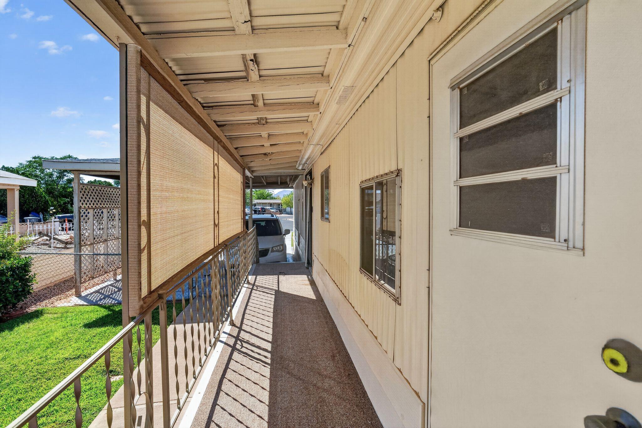 Opportunity awaits with this affordable 3-bedroom, 2-bath manufactured home offering 1,344 square feet of living space in a well-established, non-HOA neighborhood at 2055 W. 1760 N., St. George, UT. Built in 1978, this property is ready for updates and renovations, making it an excellent opportunity for investors, first-time buyers looking to build equity, or anyone wanting to customize a home to their own style. The spacious grass yard provides plenty of room for outdoor living, gardening, pets, or entertaining. Conveniently located near shopping, restaurants, parks, schools, medical facilities, and other everyday amenities, you'll enjoy easy access to everything St. George has to offer while benefiting from the freedom of a neighborhood with no HOA. Whether you're looking for your next investment project or a home with great potential at an attractive price, this property is one you won't want to miss.