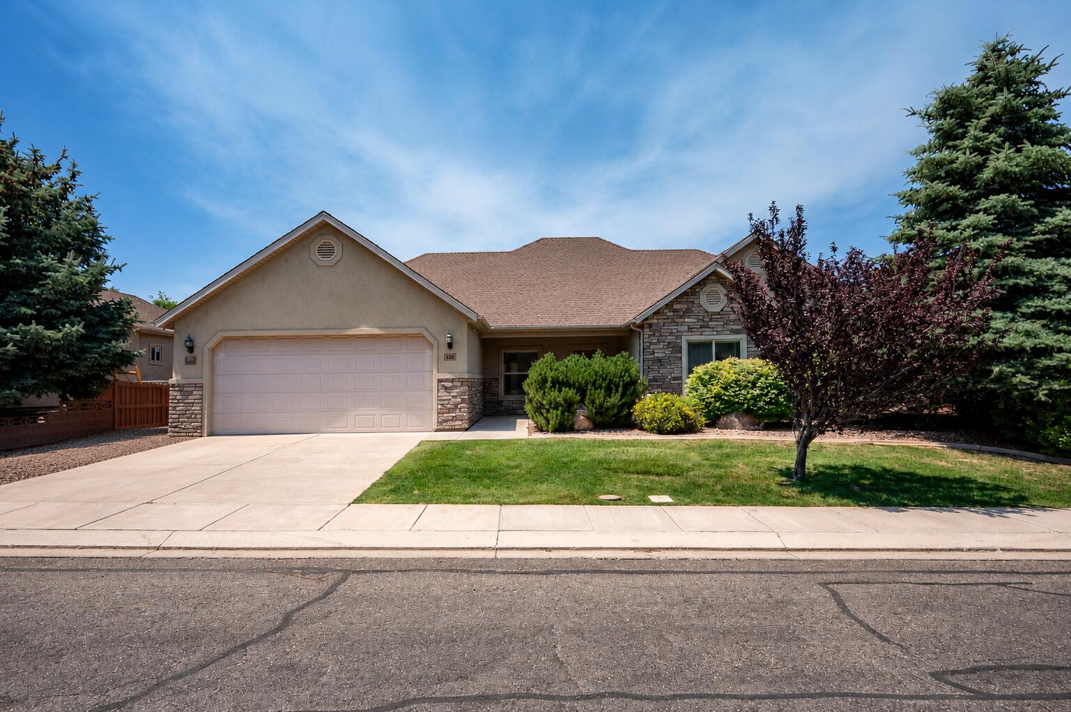 This 3-bedroom, 2-bathroom home offers 1,726 square feet of living space on a .17-acre lot with a functional open-concept floor plan designed for comfortable living and entertaining. The kitchen features ample cabinet space, a closet pantry, and an oversized walk-in pantry conveniently located off the kitchen near the laundry room. The laundry room includes additional cabinetry and countertop space for extra storage and organization. The garage also offers a dedicated storage closet with shelving, providing a convenient place to keep seasonal items and tools tucked away. 
The spacious primary suite features dual vanity areas, a jetted tub, walk-in shower, and a large walk-in closet. The second bathroom includes a walk-in shower for added convenience. Step outside to a fully fenced backyard with a block wall and a covered patio, creating a great space for outdoor gatherings, relaxation, or enjoying Cedar City's beautiful seasons. Conveniently located in the desirable Villas at Sunset Canyon community, this home offers thoughtful storage solutions, comfortable living spaces, and a fantastic location close to shopping, dining, and local amenities.
