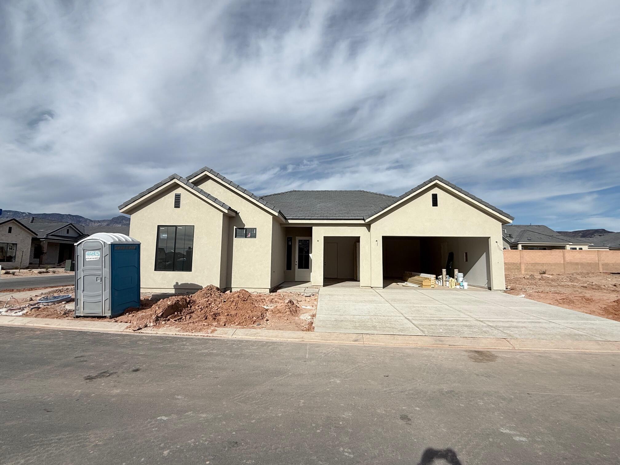 This brand new home will be ready for move in by Christmas!! This new SunRiver community is just West of Toquerville and will have over 1,200 homes and the amenities and lifestyle that SunRiver is famous for. 1st phase of amenities breaking ground in late 2025 and ready for use late 2026. This home is a Tara spec home with over $78K in design upgrades and comes fully landscaped. No HOA for first 2 years after closing to Founders Club (first 74 homes.) Visit www.sunriver.com to see all the details. Buy now and get larger homesites close to amenity. This home qualifies for HECM purchase, as low as $379,900 down with no mortgage payment if over 62 years old, for qualified borrowers.