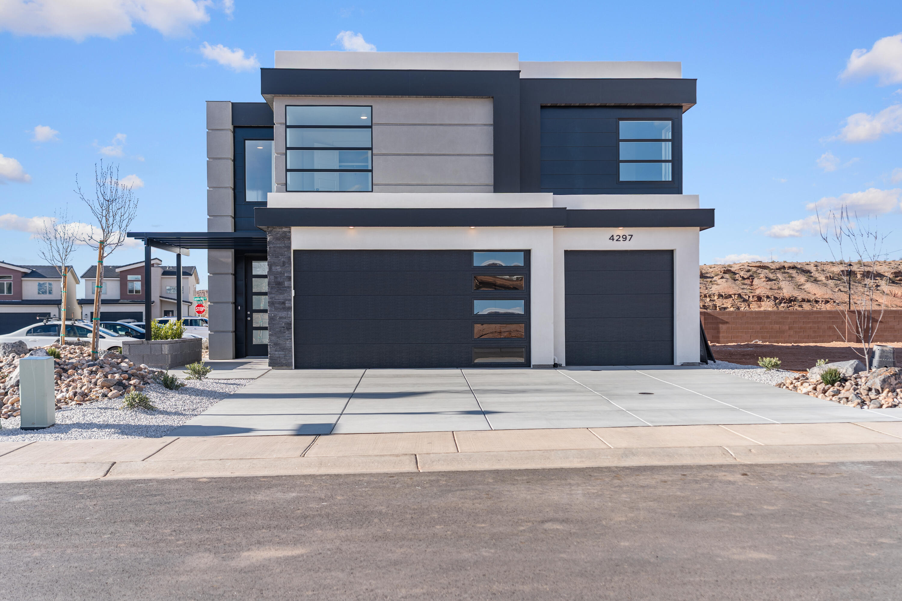 4 bed with Primary on the main level, 2.5 bath home with a 3-car garage in the brand-new Desert Reflection community by Salisbury Homes. Features include EVP flooring in main living areas and bathrooms, upgraded carpet in bedrooms, quartz countertops throughout, stainless steel gas appliances (fridge not included), modern cabinets, and kitchen backsplash. Community park, trails, and amenities nearby. NOTE: Interior and exterior finishes are predetermined and may change. Photos are examples of the finishes are also subject to change. Buyer/agent to verify all info.