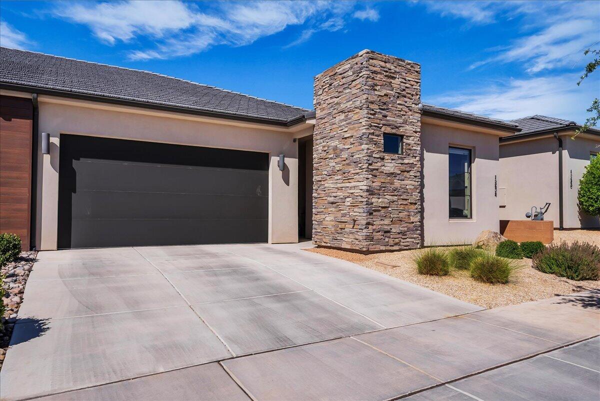 Experience effortless living in Sun River Villas. This beautifully upgraded 2-bedroom, 2-bath home combines modern finishes with low-maintenance convenience in one of St. George's premier active lifestyle communities. Featuring tile flooring throughout, custom window coverings, included appliances, owned Water Softener and a private covered patio perfect for enjoying warm Southern Utah evenings, this home is truly move-in ready. Beyond your front door, enjoy resort-style amenities including a community pool and spa, pickleball and tennis courts, walking trails, golf, and stunning red rock scenery. Whether you're searching for a year-round home or the perfect lock-and-leave getaway, this exceptional property is ready to welcome you home.