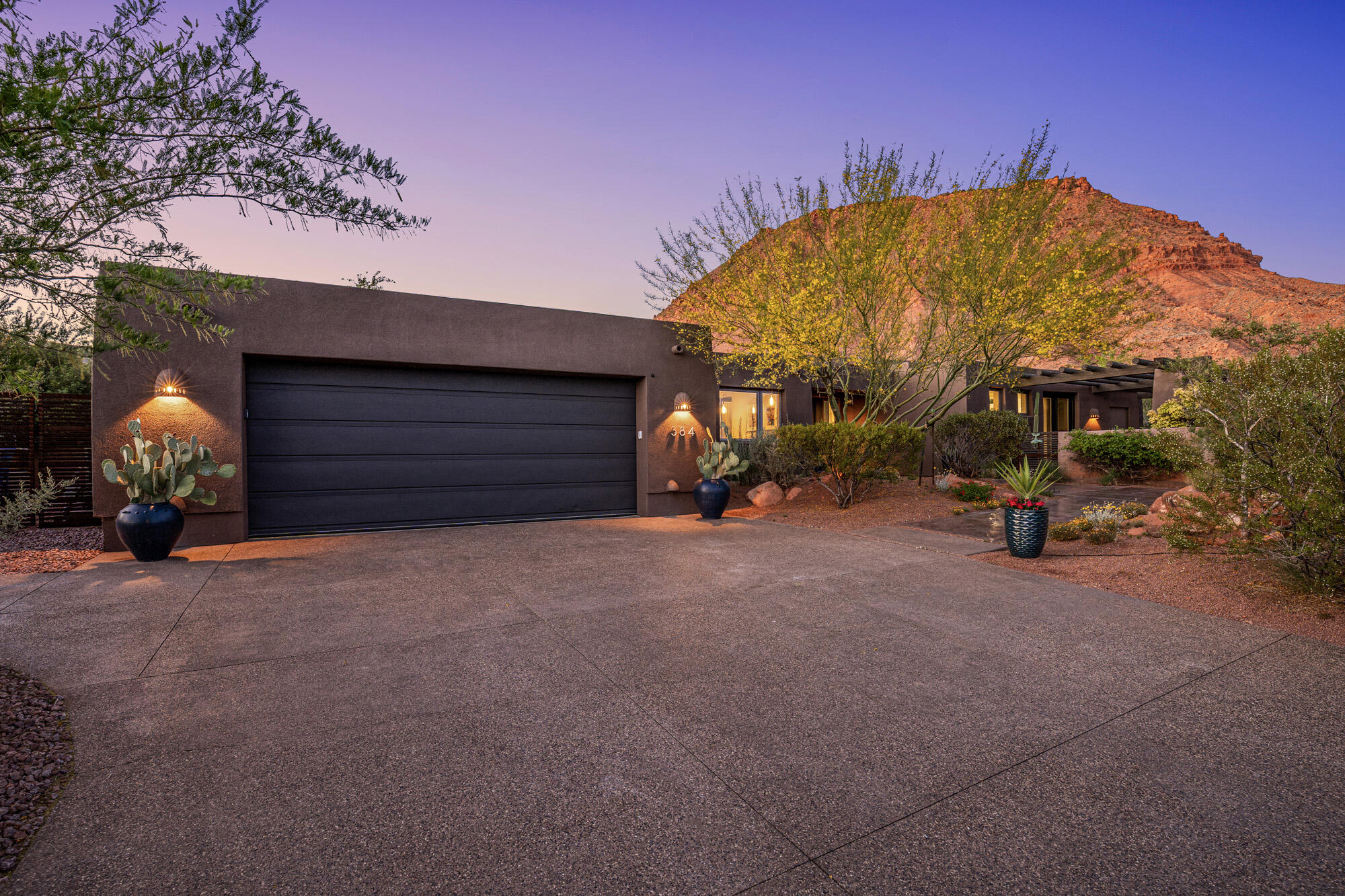 Discover perfect serenity in this stunning Kayenta-Ivins-Utah Retreat! Nestled against the Towering Red Cliffs, a beautifully remodeled home offers unobstructed Views. The Kayenta community delivers a true escape from the world- surrounded by dramatic red rock landscapes, endless blue skies & peacefulness of star-lit nights.  Completely transformed in 2026, the shines with all-new interior paint, refinished cabinets, hard wood doors and concrete floors. New Exotic Granite Counters, modern lighting and thoughtful updates create a fresh , contemporary feel.  The updated landscapes enhances the private yards, providing low-maintenance outdoor spaces perfect for relaxing & entertaining.  Private Custom Pool & Spa perfect for morning swims with cliff views or evening soaks under the stars.  This is more than a home- it's a lifestyle of peace, privacy & natural beauty!