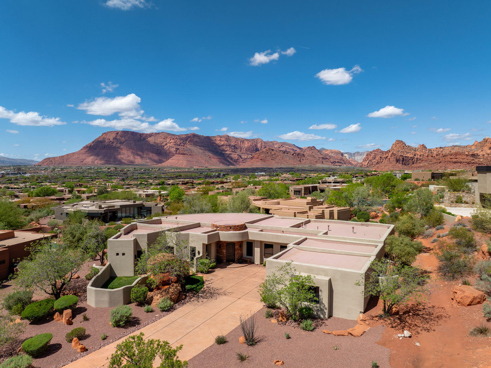 Experience the beauty of this stunning home nestled within the exclusive gates of Entrada. Combining modern elegance with timeless design within an open-concept layout. Featuring a Control 4/Smart Automation System, gourmet chef's kitchen with custom cabinetry, premium stainless-steel appliances and Wolf gas range top, granite countertops and large island. The inviting living area is complimented by expansive floor-to-ceiling windows that capture sweeping red rock and golf course views. Primary suite with a spa-inspired bathtub, walk-in shower and private patio access. Outdoors, enjoy expansive patios with desert landscapes and breathtaking views next to your private pool and spa. Enjoy world-class amenities including golf, pools, fitness, dining, and social events. The monthly HOA dues for Kachina Cliffs are: $155.08 - because they are custom homes up on the cliff there are no "neighborhood dues"
Social Dues are 234.30/month - they are mandatory and allow you to be an Associate member, these are in ADDITION to the HOA dues. Gives access to Clubhouse, etc. (Total dues: $389.38)
You can purchase an Equity Membership which gives you golf privileges. Those are currently $125k to buy into it and the dues are $1,250.00 per month.
There is no reinvestment fee, but there is a $285 set up fee for all new owners, "PMP Admin Fee".
Annual food expense is $800/year at the restaurant.