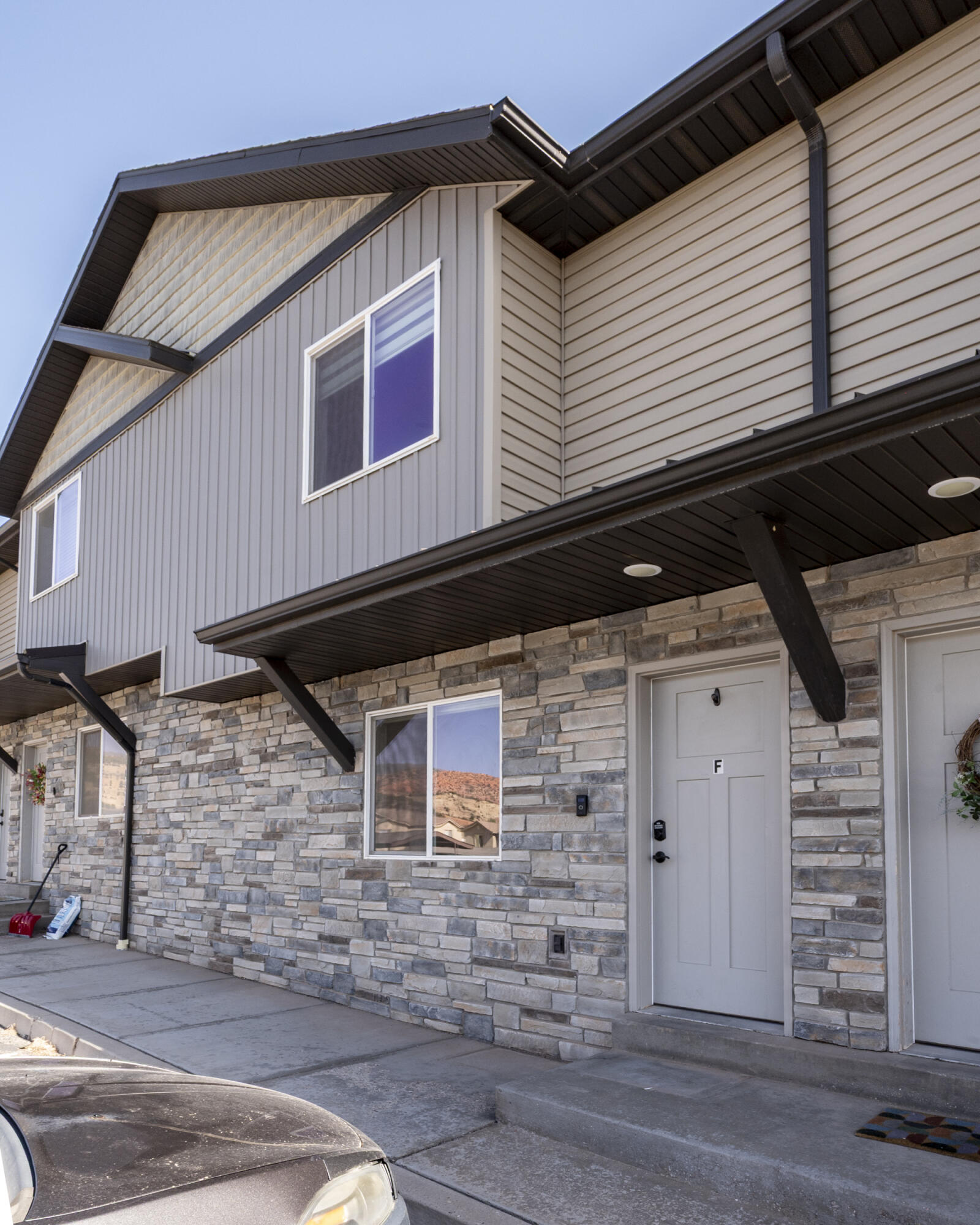 AMAZING LOCATION! Just 5 minutes from SUU and conveniently situated near all the shopping, dining, and amenities that Cedar City has to offer. Step inside to an open-concept main level complete with a spacious living area, kitchen with center island and corner pantry, a generous half bath, under-stair storage with crawlspace access for added space, and sliding glass doors leading to the fully fenced rear patio. Upstairs features 3 bedrooms, 2 full bathrooms, and conveniently located laundry. Enjoy direct access to the C Trailhead with nearby hiking and walking trails just steps away. Truly the perfect blend of convenience, comfort, and outdoor recreation! Previously a successful student housing property, this unit is ideal for owner occupants or investors alike. From the moment you step inside, you'll appreciate the thoughtful layout and exceptionally well-maintained condition of this home. As one of the newer units within the Trailside community, this property offers a more modern feel while still being perfectly positioned near everything Cedar City has to offer. Located just minutes from Southern Utah University, this property has previously performed successfully as student housing, making it an outstanding opportunity for investors, parents purchasing for students, first-time buyers, or owner-occupants alike.

The open-concept main level was designed with functionality and everyday living in mind. The spacious living room flows seamlessly into the kitchen and designated dining area. The kitchen features a highly functional layout complete with a large center island, stainless steel appliances (all INCLUDED!) and a deep corner pantry offering excellent storage space. Sliding glass doors off the dining area provide direct access to the generously sized, fully fenced rear patio.

Additional main-level features include durable laminate flooring throughout, a conveniently located half bath for guests, and under-stair storage with crawlspace access that provides even more storage potential rarely found in similar properties.

Upstairs, the spacious primary suite offers a comfortable retreat complete with a large walk-in closet and private ensuite bathroom. Two additional secondary bedrooms are located toward the back of the home, each featuring their own closet space and flexible functionality for roommates, guests, office space, or family needs. The secondary bathroom includes a walk-in shower (no tub), under-sink storage, and cabinetry above the toilet for even more storage. The laundry is conveniently located upstairs between the bedrooms, and the stacked washer and dryer are INCLUDED! Carpet flooring upstairs helps create a warm and comfortable feel, while laminate flooring in the bathrooms offers easy maintenance.

This property has been professionally cleaned and shows minimal wear and tear, making it move-in ready for its next owner. The furnishings currently in place can remain, providing a turnkey opportunity for investors or added convenience for owner-occupants.

The community offers ample parking with plenty of room for both residents and guests--an important feature for student housing or multi-occupant living arrangements.

Outdoor enthusiasts will appreciate the direct access to the nearby "C" Trailhead located essentially right in your backyard. The popular 4.42-mile "C" Trail climbs to the scenic "C" Overlook, showcasing expansive views of Cedar City, surrounding mountains, desert landscapes, and valley views. The trail is part of the Iron Hills Trail System, which has been designated as a National Recreation Trail, offering incredible access to hiking, walking, running, and outdoor recreation just steps from your front door.

Whether you're searching for a low-maintenance primary residence, a first-time home purchase, student housing investment, or other college-area rental property, this property offers an exceptional combination of location, functionality, recreation access, and investment potential.

3 minutes to Smith's Grocery Store, CAL Ranch, and T.J. Maxx
4 minutes to I-15
5 minutes to Southern Utah University
5 minutes to Downtown Cedar City
5 minutes to shopping and restaurants at Providence Center
10 minutes to Intermountain Health Cedar City Hospital
12 minutes to Cedar City Regional Airport
50 minutes to St George
2.5 hours to Las Vegas
3.5 hours to Salt Lake City