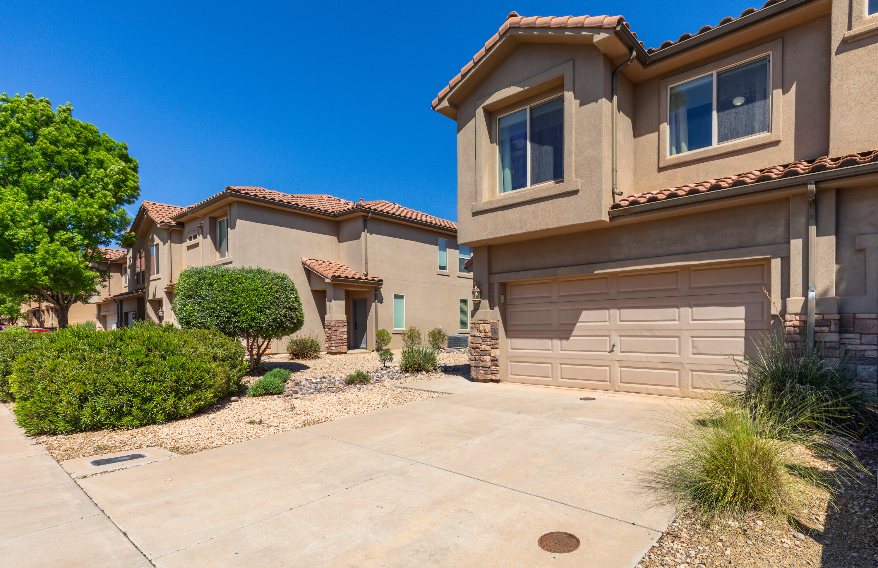 Maintenance free, turn-key townhome within walking distance to parks, trails, schools, grocery, and restaurants. This 3 bed/2.5 bath end-unit comes fully furnished including a fully equipped kitchen and private patio. The home has been meticulously cared for as a second home by its original owners. This was the model unit for Tuscany at Cliffrose, displaying the highest quality and most functional layout. It is move-in ready in every way: appliances, bedding, utensils, garage tools...and a huge walk in closet - perfect for primary owners, second homes, or investors. Enjoy Proximity to Tuacahn, Snow Canyon, Black Desert Resort, Gunlock Reservoir, and a 30 minute drive to the expanding St George Regional Airport.

Notes: HOA amenities include Exterior Maintenance; Park, playground, BBQ/pavilion; Pest control; Short term parking for RV/boats.

Tax note: used as secondary residence - 2025 tax figures do not include residential exemption