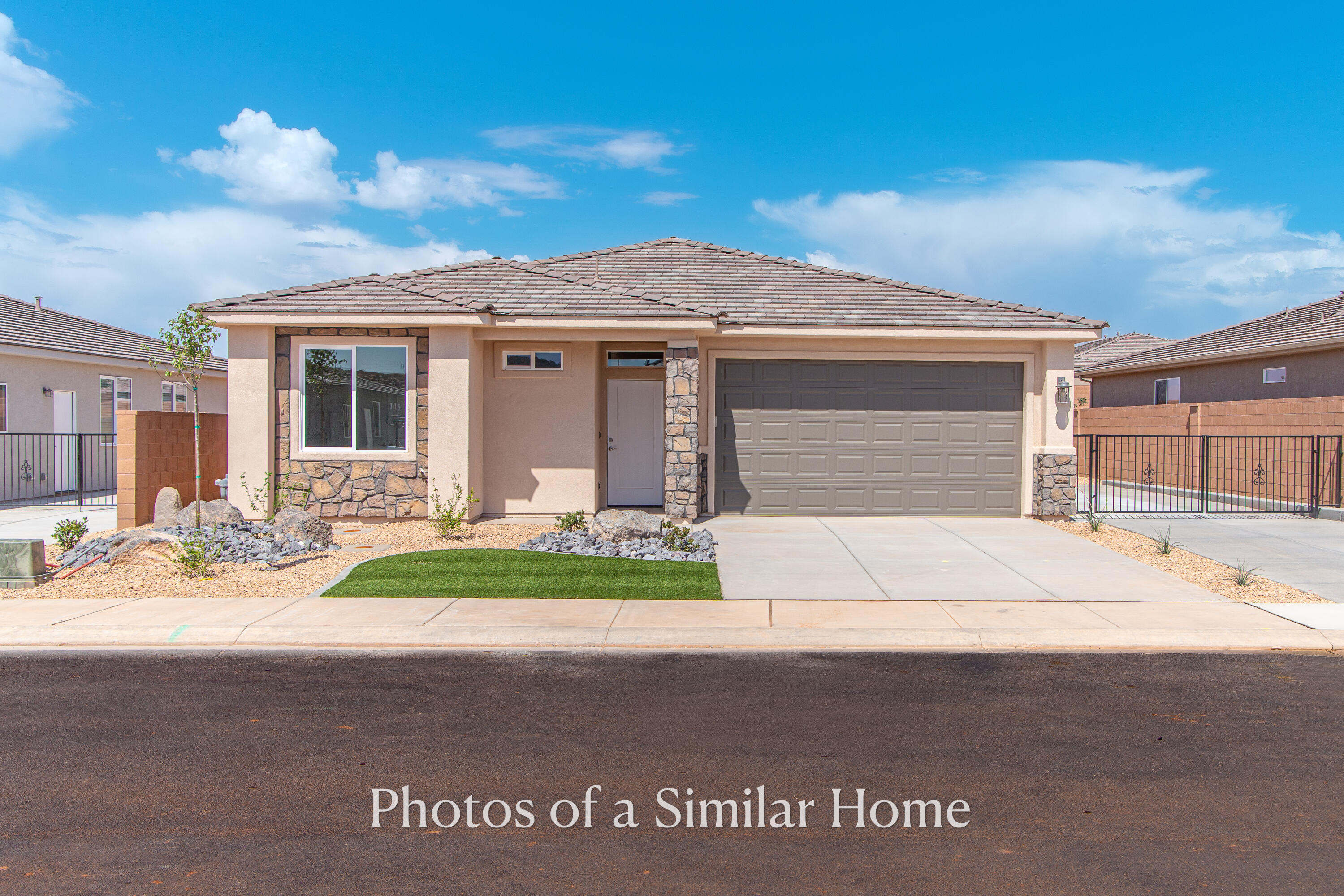 Gemstone Custom Homes - Under Construction! Projected to be complete in Early Autumn - 2026. No HOA! Some photos are of a previously built home (same floor plan). This home features drought-tolerant professionally landscaped front and backyard with a covered patio. Master suite includes spacious walk-in closet and fully-tiled recessed walk-in shower with glass door, stand alone tub (not pictured), dual sinks in the vanity and instant hot water thanks to the tankless water heater with recirculation pump. The shower in the guest bath is tile as well. The flooring in all public areas of the home is super durable wood grain tile planks - much better than LVP. Bedrooms are quality carpet. Also included is a gas fireplace in the great room, covered patio faces East and provides plenty of shade on those hot summer afternoons. Two car garage is nearly 23' deep - long enough for very big pickup trucks. Plus it's fully finished with drywall and painted...it's even fully insulated (walls, ceiling, and garage door)! Adjacent to the garage is a 15' wide concrete RV with full hookups (sewer dump, 50 Amp electric, water). Quality GE appliances, stainless sink in the kitchen island, Moen Plumbing fixtures, quartz countertops, spacious pantry, and classic stained hardwood cabinetry. Doors are solid hardwood and boxes made of 9-ply birch, all with soft-close hinges. Plus, the kitchen cabinets include under-cabinet lights that provide the perfect amount and hue of light onto the countertops where you need it. Construction set to begin late April means the plans and finishes are still very customizable to make the home fit your needs perfectly.