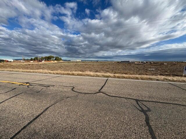 Great 2.04 acre commercial lot available for sale with 0.500 acre foot of water right #71-1221 (Priority Date 3/30/1942). Well start card has been approved for immediate well drilling for your next great business idea. Power is available right to the property. If you have been thinking of a place for storage units, or to put in a car wash or any other great business idea, this is the perfect highway commercial