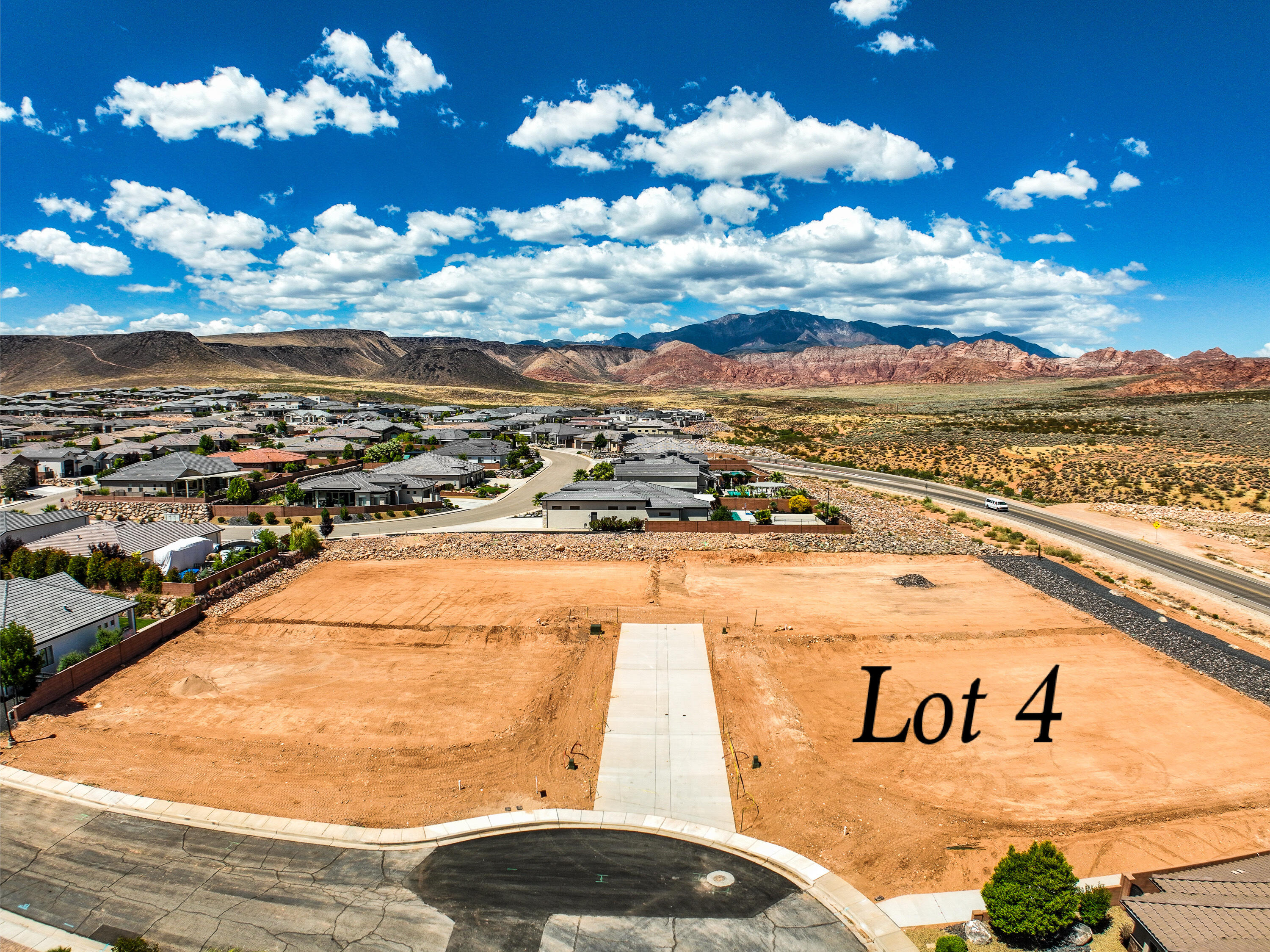 Exceptional opportunity to build in an exclusive new four-lot subdivision, ideally situated just off Washington Parkway and surrounded by established, upscale neighborhoods. These premium homesites offer convenient access to shopping, dining, recreation, and major travel routes, all while showcasing breathtaking views of the iconic red rock landscape. Generous lot sizes provide the perfect canvas for a custom home designed to fit your vision.