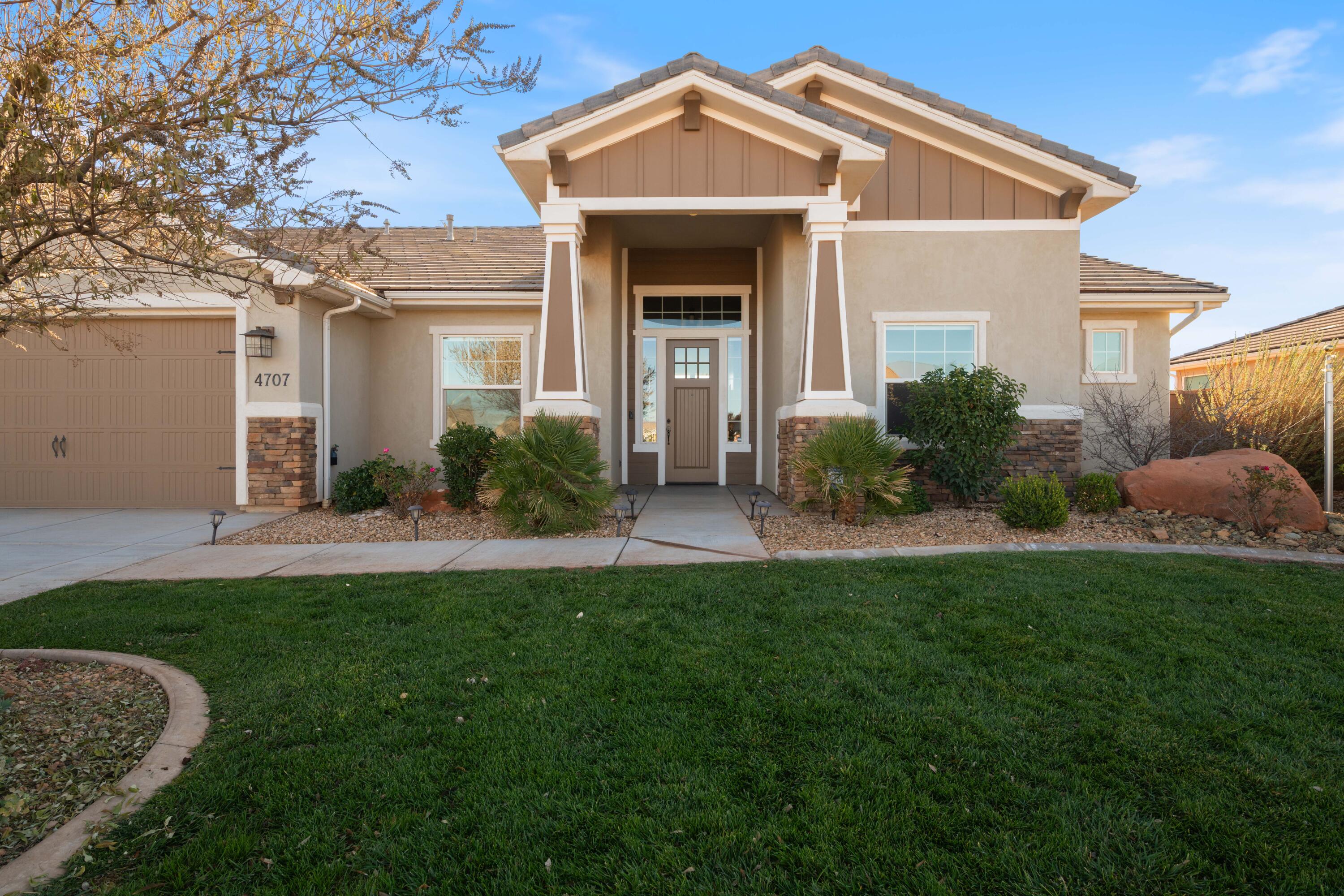 Nestled in the desirable Stucki Farms area, this 4-bedroom, 2.5-bath former builder's model home is packed with upgrades and thoughtful details throughout. Enjoy an open floor plan, upgraded finishes, 2x6 exterior walls, a radiant barrier, a reverse osmosis system, a large pantry, Everlights, and two covered patios for year-round outdoor living. The 38' heated and cooled RV garage is a standout; ideal for RVs, toys, storage, workshop, and includes built-in storage. The flexible 4th bedroom can serve as an office. Outdoor enthusiasts will love the location, ride ATVs straight from your garage to miles of Warner Valley trails, with Sand Hollow just over the hill for boating and water fun. The fully enclosed backyard with great mountain views and no backyard neighbors. Minutes from SR-7, close to great amenities, convenient to the airport, located in Dixie Power, and move-in ready.