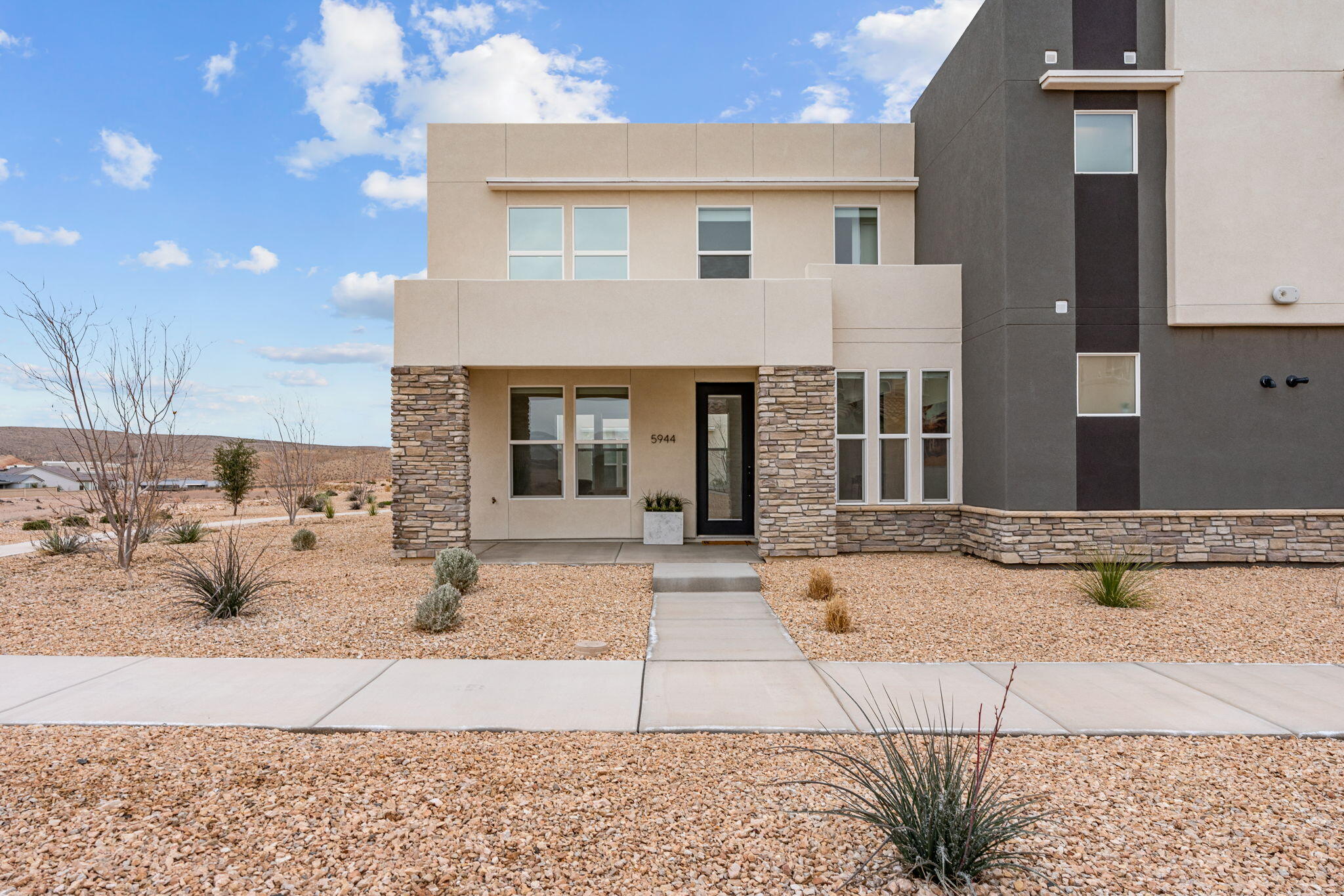 Wake up where others vacation! This bright, open-concept home in the heart of Desert Color's resort-style community features vaulted ceilings, sun-filled living spaces, mountain views, and direct access to the shores lagoon, trails, and recreation, this home delivers the ultimate Southern Utah lifestyle.  

Backing to open space and capturing incredible mountain views, this 3-bedroom, 2.5-bath home features an airy open-concept layout with vaulted ceilings and abundant windows that fill the space with natural light.

The extra-deep 2-car garage offers plenty of room for all your adventure gear — bikes for the trails, paddleboards for the lagoon, or even your off-road toys.  Come see today!