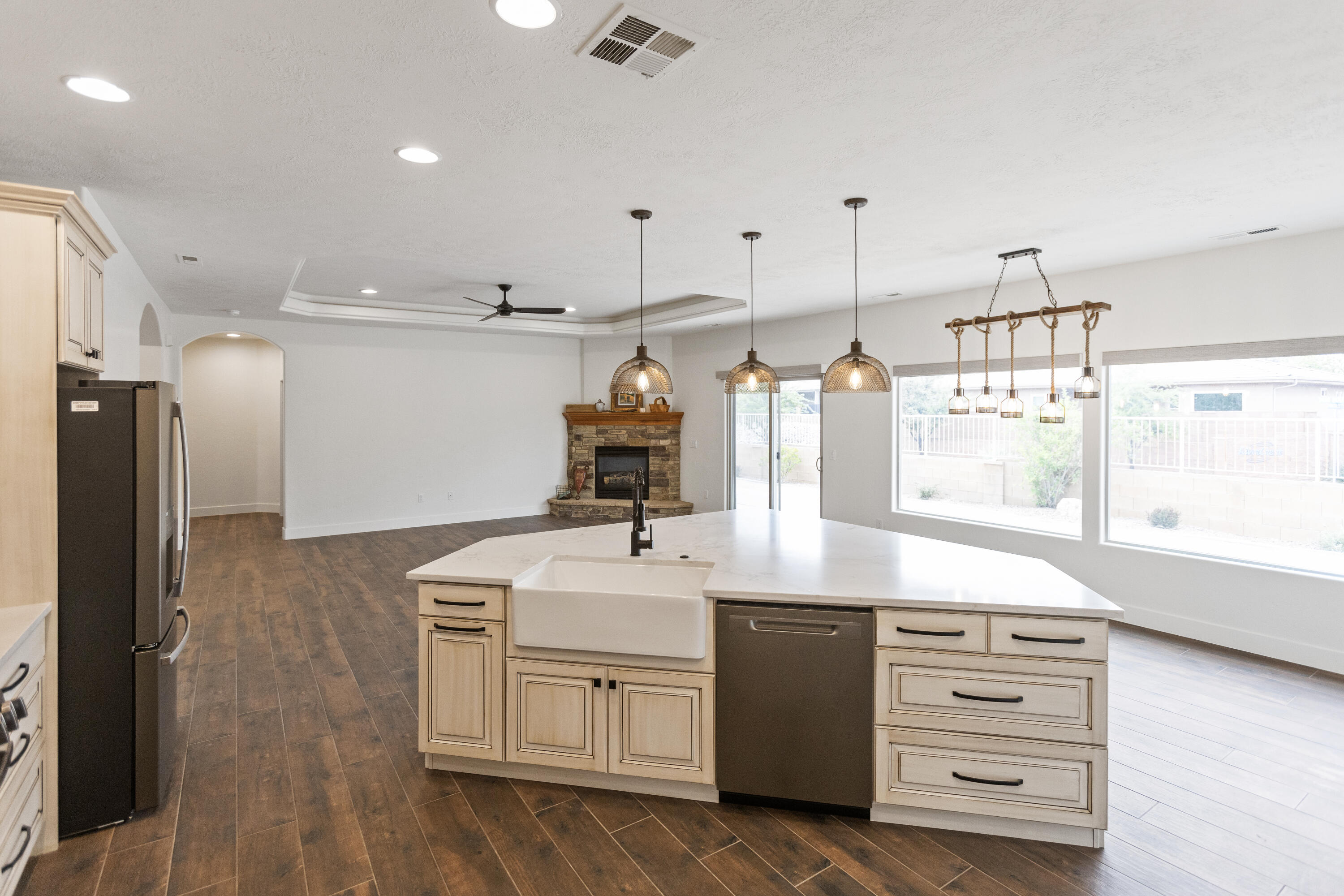 Fully remodeled and move in ready! This beautifully updated 4 bedroom home is located in highly desirable community with great views of Pine Mountain. Thoughtfully designed throughout, the home features tile flooring, spacious open layout and abundant natural light. The kitchen is a true centerpiece showcasing custom cabinetry with pots/lid drawers, oversized island and a stylish tile backsplash all complemented by a brand new appliances. The spacious primary suite  offers a relaxing retreat with a fully remodeled ensuite bath that includes modern finishes, tub, walk in shower and spacious closet. Additional upgrades include a recirculating hot water system, new water heater, new water softener, central vac system, remote controlled blinds in the family room and plantation shutters in the front rooms. Enjoy seamless indoor/outdoor living with a charming front courtyard complete with a firepit and fountain.