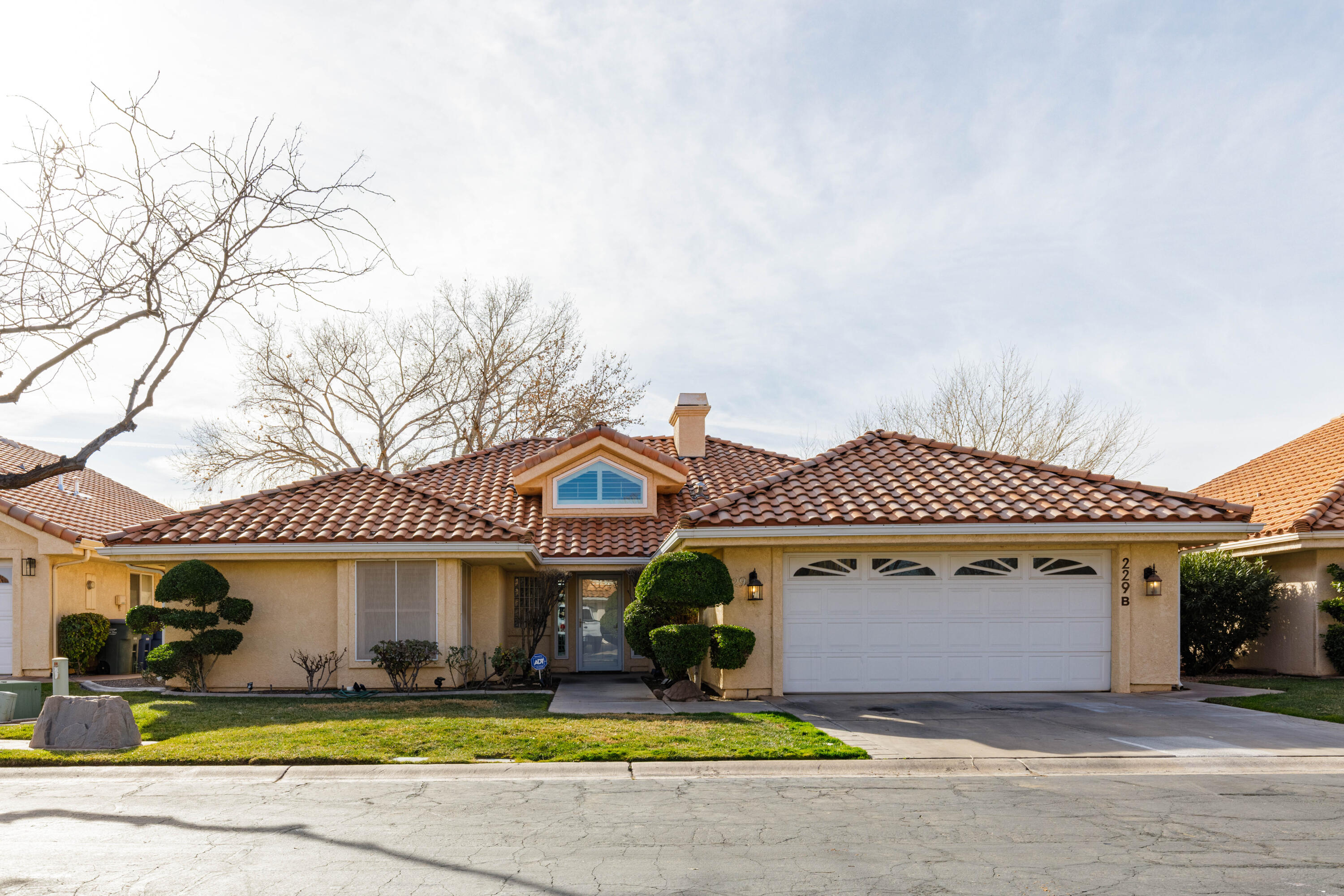 Rare find in a sought-after setting. This upgraded, move-in-ready home shines. Walk through the inviting entrance to discover a spacious, light-filled living room with a cozy fireplace, perfect for chilly evenings. The heart of the home is the updated kitchen, boasting white cabinetry, and oodles of granite countertops that is sure to impress the family chef. This large gourmet kitchen has abundant natural light, and views of the open space behind. No back neighbors! Classic shutters throughout for privacy and timeless style. The expansive primary suite truly feels like a retreat. Best of all, the property backs up to the scenic Santa Clara River corridor, delivering serene, nature-filled surroundings. Plus, enjoy the community pool just steps away for effortless, resort-style living.