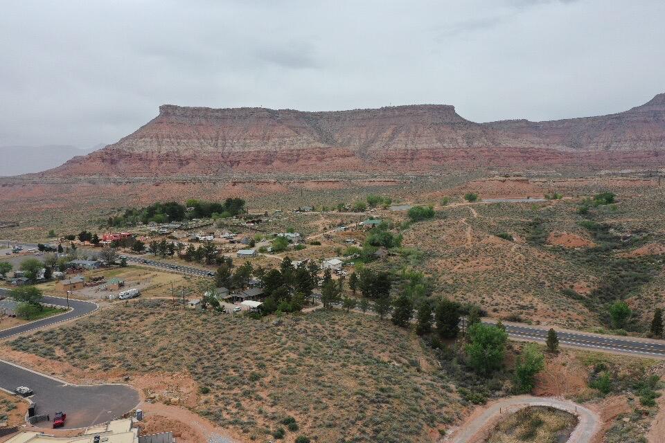 Set amid the striking red rock landscape of Virgin, Utah, this premium view lot offers an exceptional opportunity to create a custom desert retreat just minutes from Zion National Park. Elevated to capture sweeping panoramic views, the property showcases a stunning blend of sandstone cliffs, open skies, and tranquil desert beauty.

Surrounded by peace and privacy, the setting is ideal for those seeking a refined second home, vacation escape, or investment in one of Southern Utah's most sought-after areas. Enjoy quiet mornings bathed in golden light and evenings under expansive, star-filled skies--an environment that inspires both relaxation and connection.

A rare offering, this lot presents the perfect canvas to design a home that complements its extraordinary surroundings while embracing a lifestyle defined by natural beauty and understated luxury. Set amid the striking red rock landscape of Virgin, Utah, this premium view lot offers an exceptional opportunity to create a custom desert retreat just minutes from Zion National Park. Elevated to capture sweeping panoramic views, the property showcases a stunning blend of sandstone cliffs, open skies, and tranquil desert beauty.

Surrounded by peace and privacy, the setting is ideal for those seeking a refined second home, vacation escape, or investment in one of Southern Utah's most sought-after areas. Enjoy quiet mornings bathed in golden light and evenings under expansive, star-filled skies--an environment that inspires both relaxation and connection.

A rare offering, this lot presents the perfect canvas to design a home that complements its extraordinary surroundings while embracing a lifestyle defined by natural beauty and understated luxury.