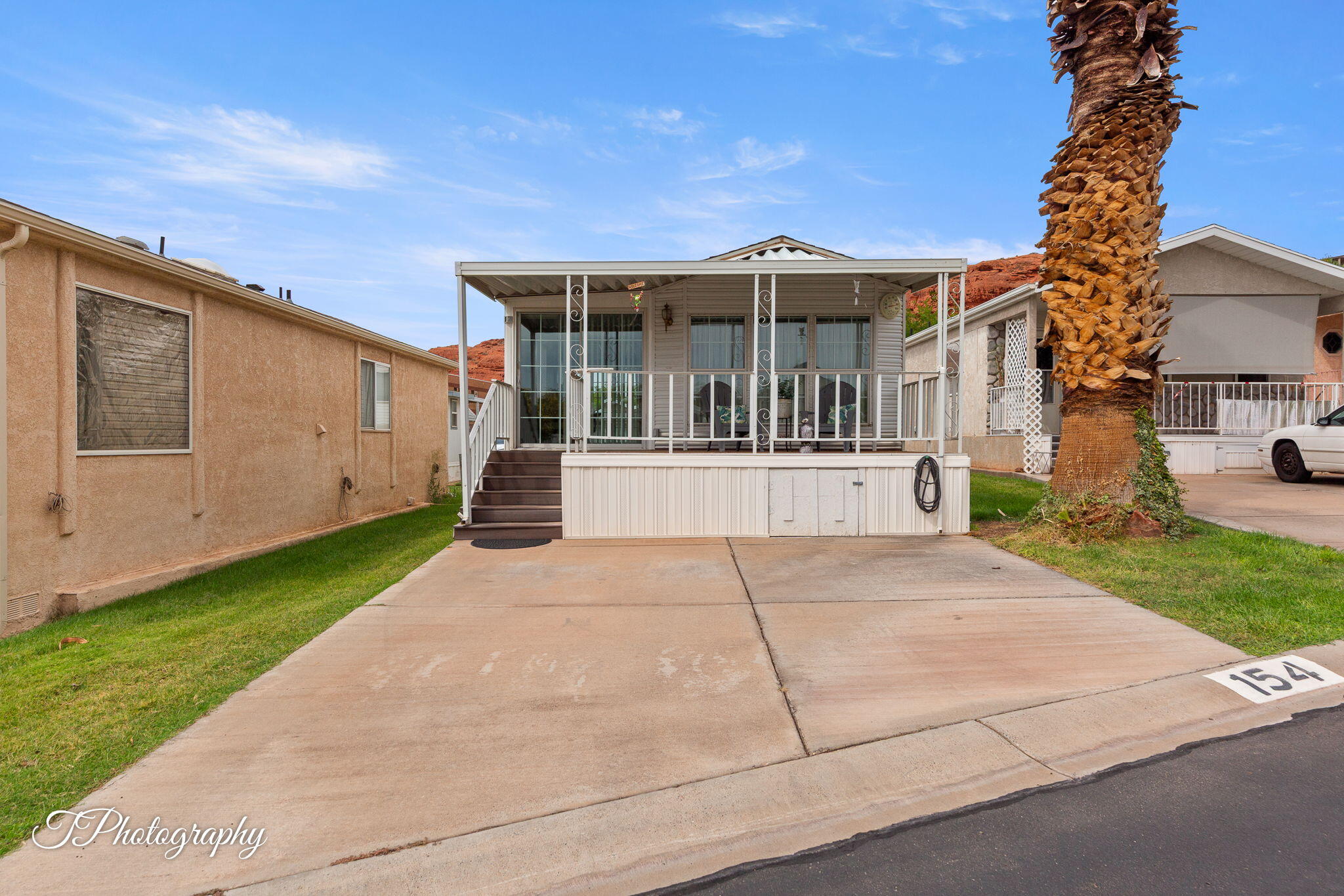 Fantastic opportunity to own an affordable, move in ready, well-maintained home. Feel the comfort when you first drive up and view a large, covered patio and 2 full size parking spaces. When you enter the home notice the open concept floor plan with vaulted ceilings, picture windows, bright and airy. Features 2 bedrooms, 2 bath and loads of storage. Remodeled bathroom, 2 water heaters, new washer and dryer, heat/ac pump 5 years old, shed with power, 2 new toilets and more. Located in Canyon Breeze a 55+ community, centrally located to all your needs. Low HOA fees of $139 a month include sewer, water, garbage, outdoor pool, private road, clubhouse, and yard maintenance. Friendly environment with lots of activities. A must to see.