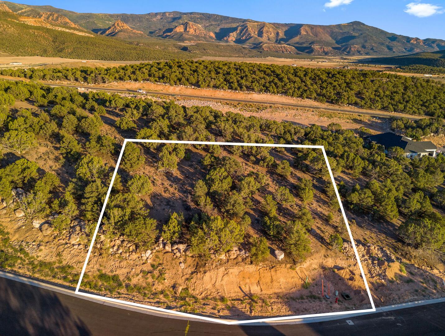 This is Lot Number 15, a .81-acre homesite located in the highly sought-after Estates at South Mountain subdivision. Enjoy stunning views of Shurtz Canyon and the surrounding Southern Utah mountains. This growing community is positioned near planned future elementary, middle, and high schools, adding long-term value and convenience. Bring your own builder or choose to build with the South Mountain Development Group. Don't miss this opportunity to secure a premium lot in one of Cedar City's most desirable neighborhoods. No HOA.