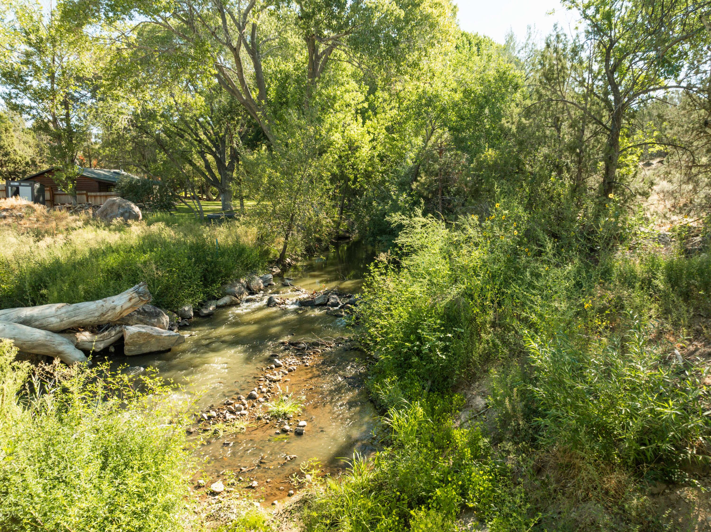 Rare Riverfront Lot in Tranquil Brookside. Build your cabin or house on .93 of an acre property that is about 30 minutes North of St. George. Electrical box and Water is on the property already. Come and see this beautiful property between the mountains and the river. Only a few minutes away from Baker reservoirs and a short drive to Pine Valley.